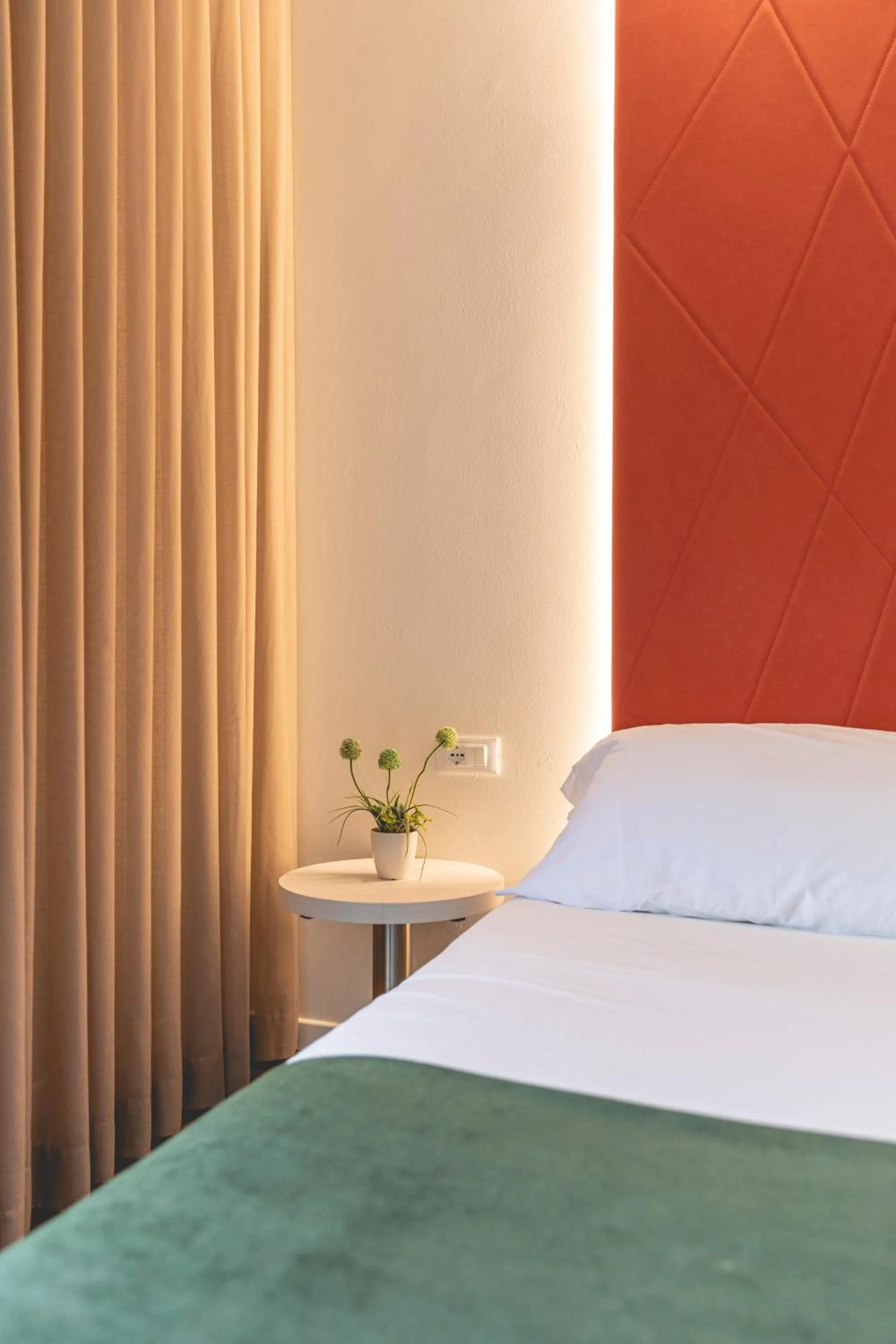 Bed in Hotel Loretta & Dependance