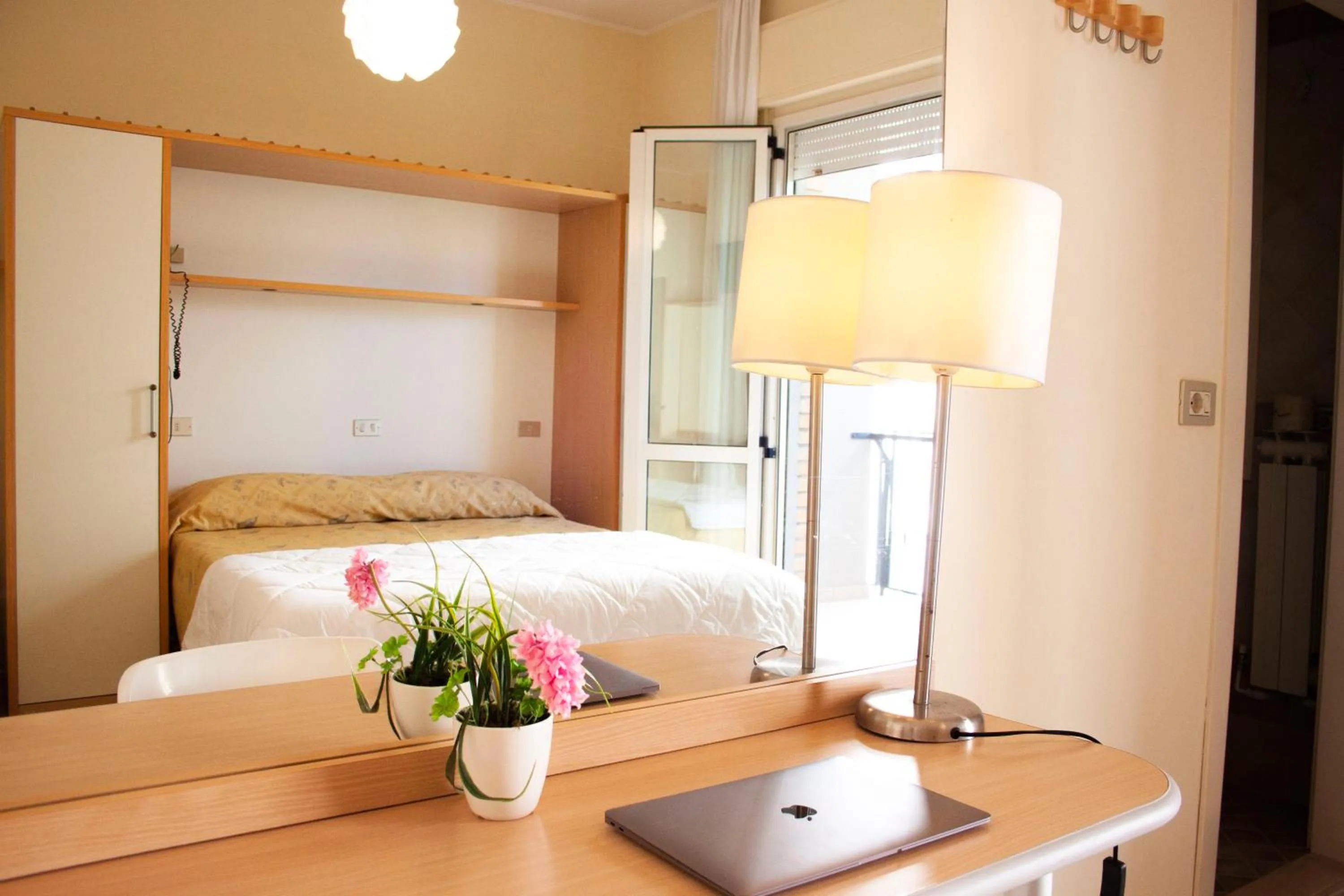 Bed in Hotel Loretta & Dependance