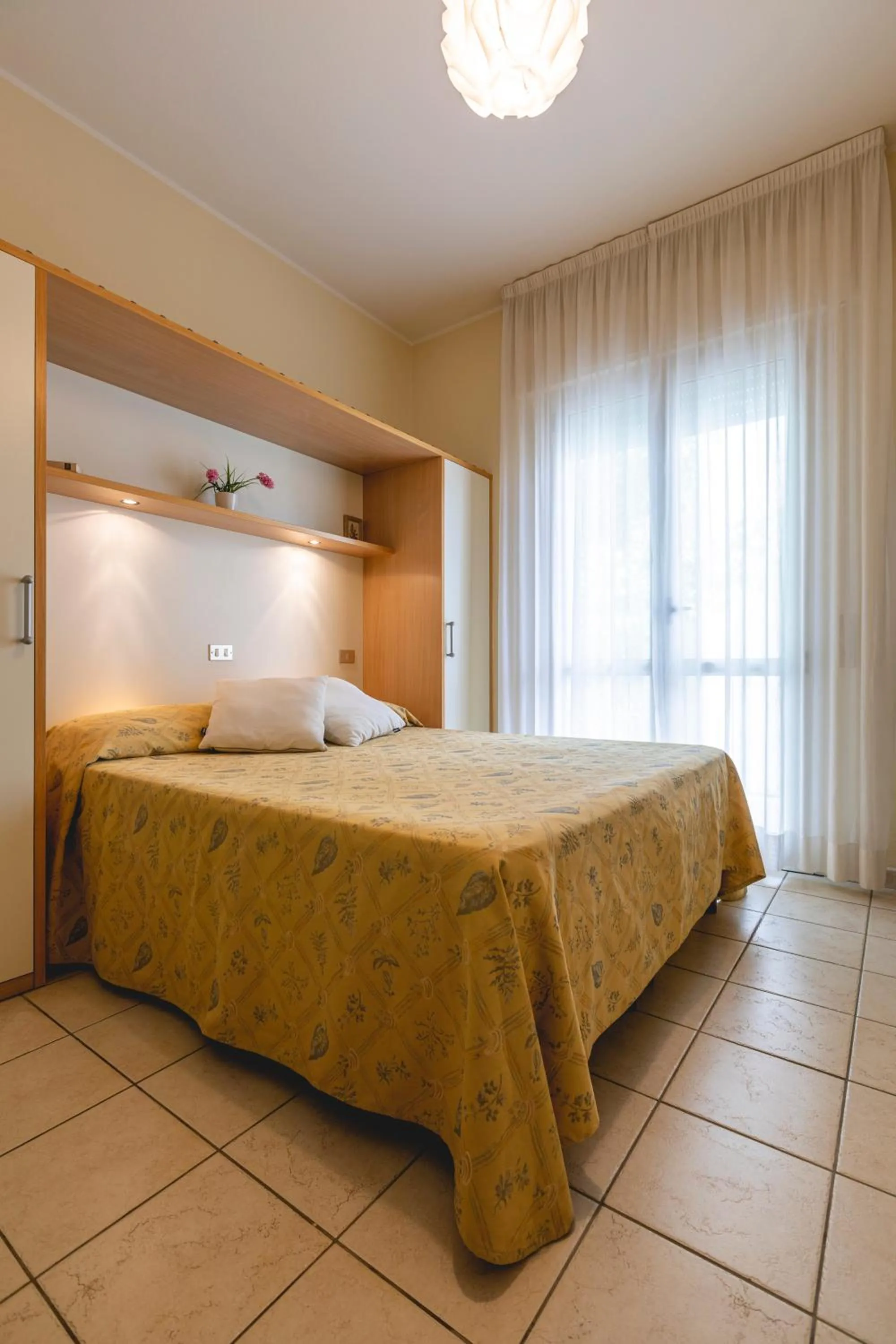 Bed in Hotel Loretta & Dependance