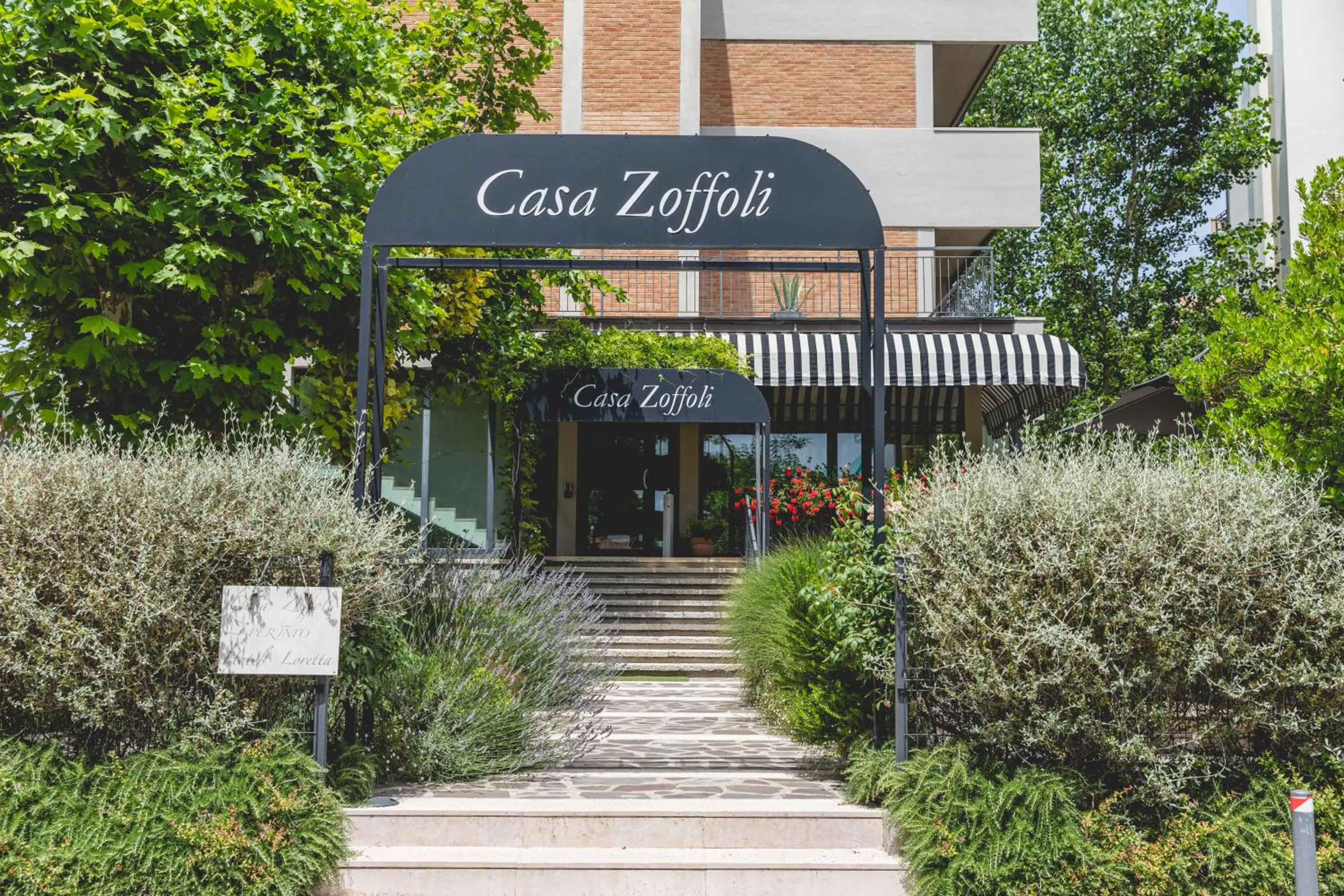 Property building in Hotel Loretta & Dependance