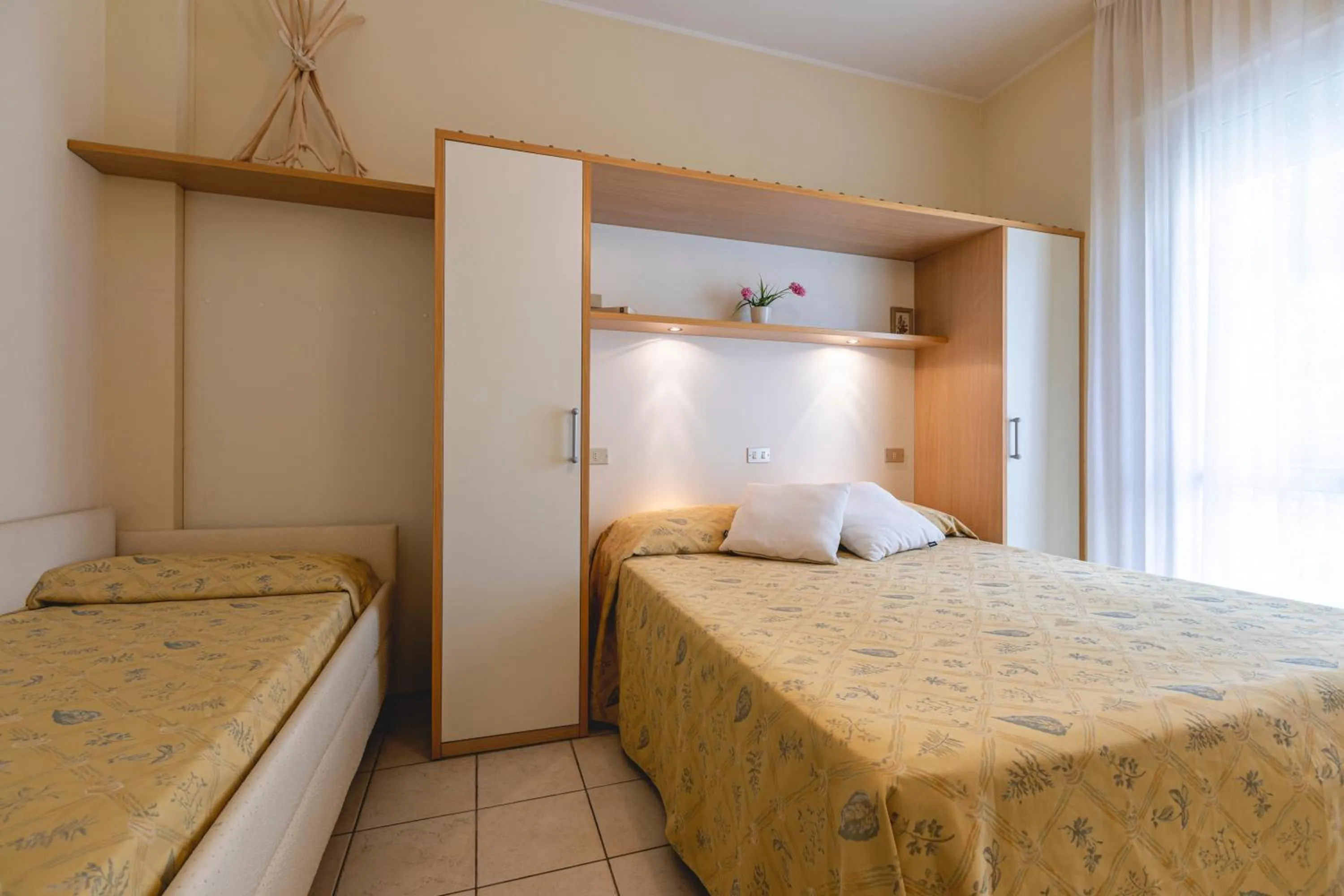 Bed in Hotel Loretta & Dependance