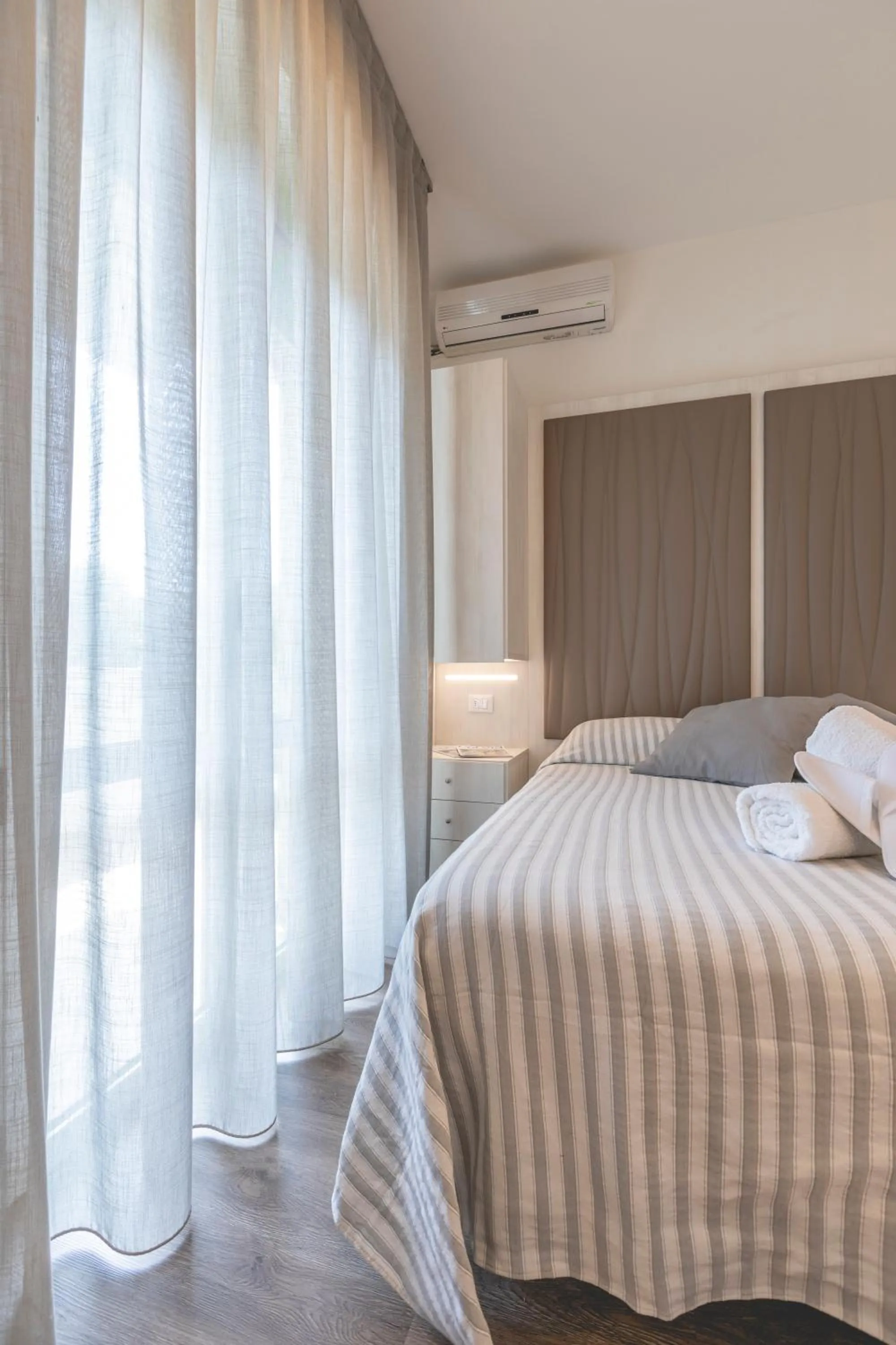 Bed in Hotel Loretta & Dependance