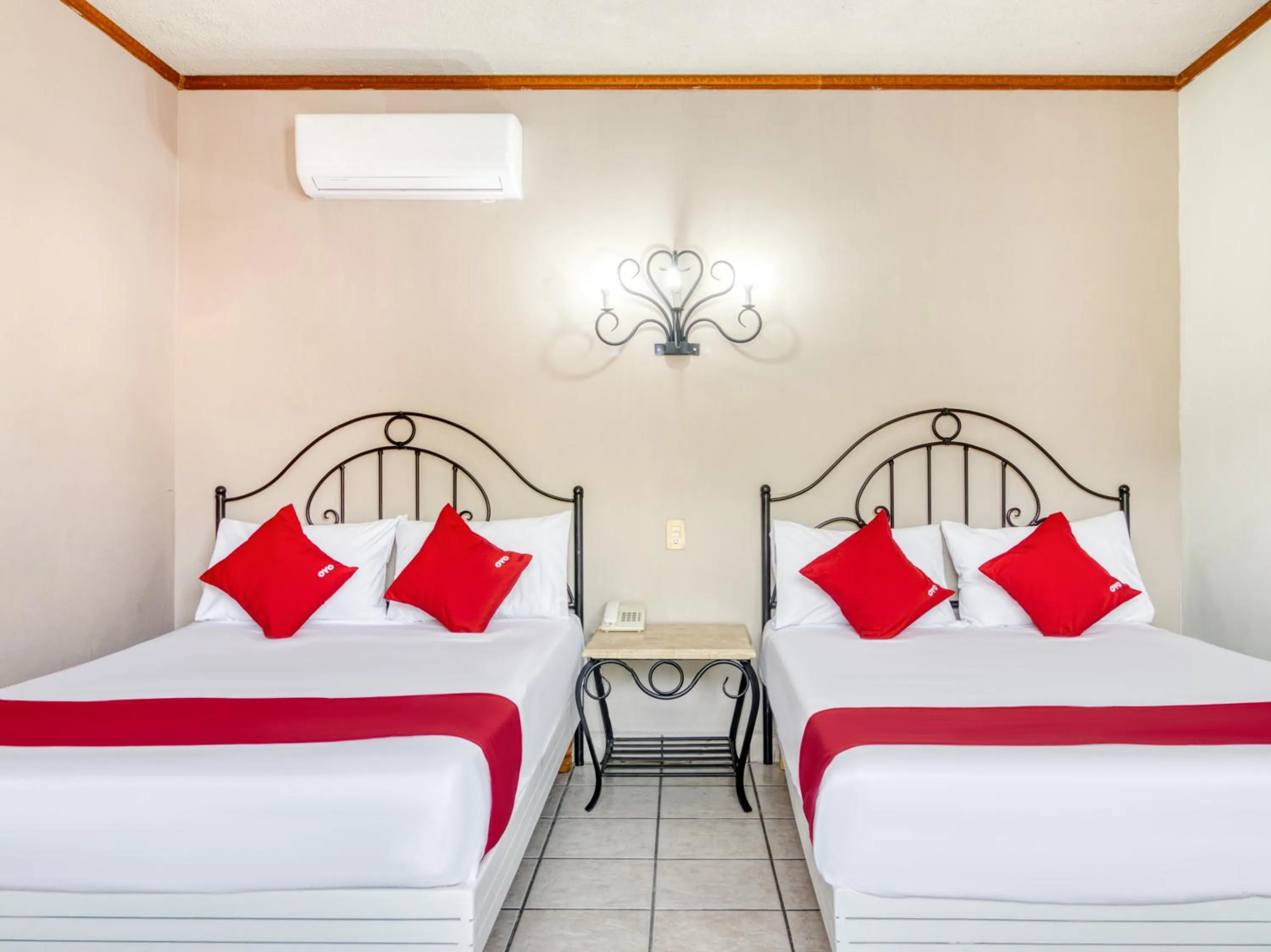Photo of the whole room, Bed in Capital O Hotel La Siesta, Gomez Palacio