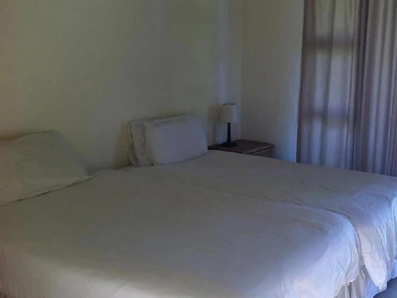 Bed in THE HAVEN HOTEL