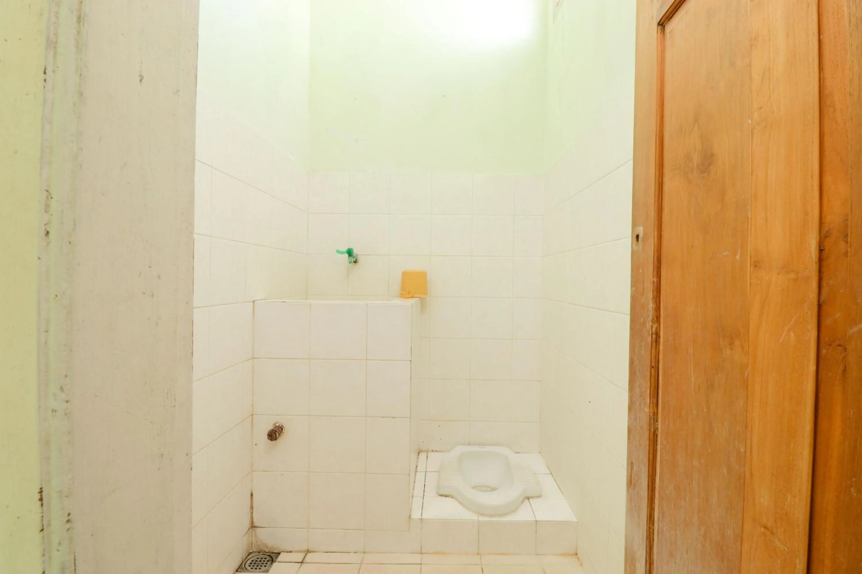 Bathroom in Satriafi Hotel