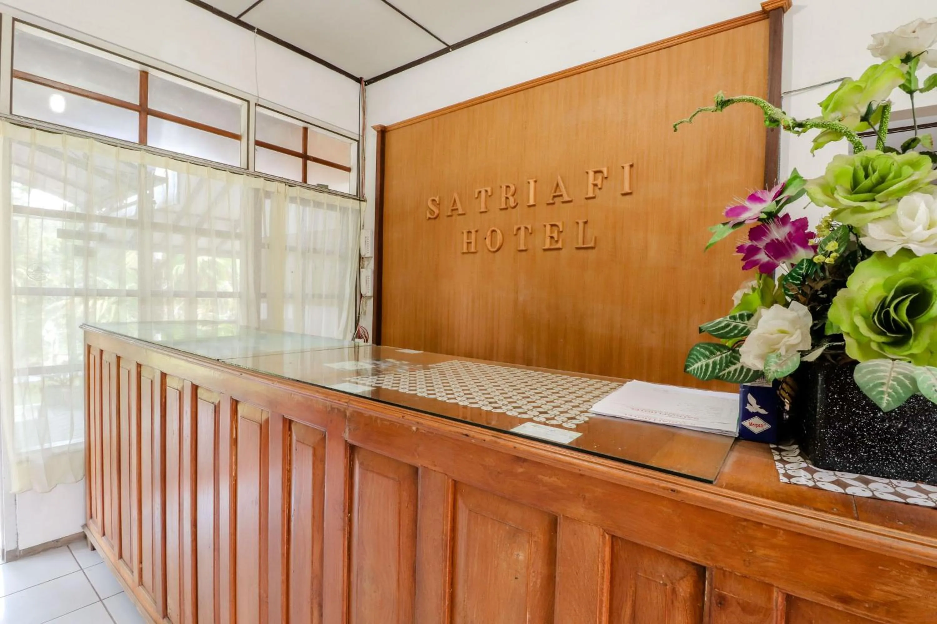 Lobby or reception in Satriafi Hotel