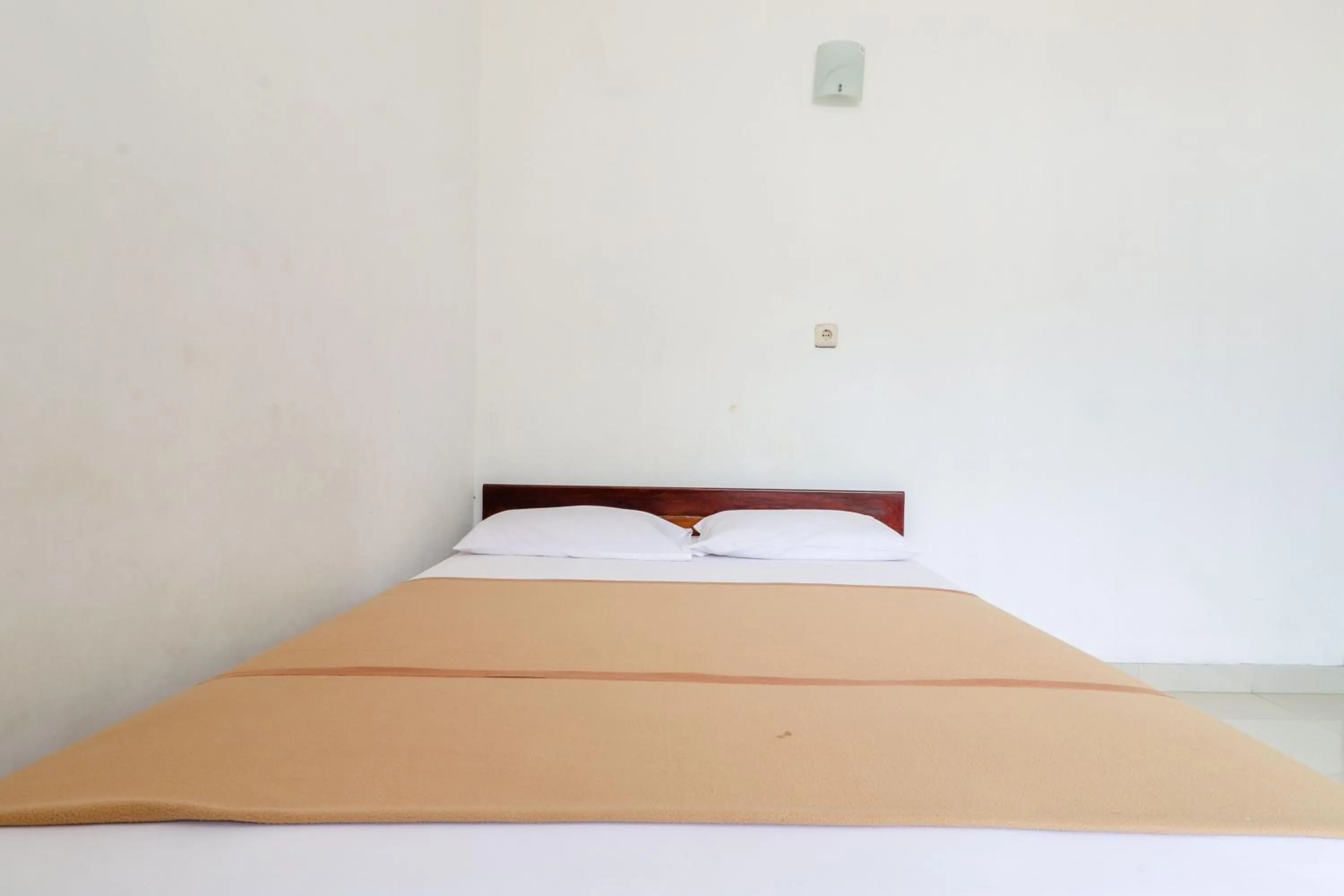 Bed in Hotel Wismancala Kaliurang