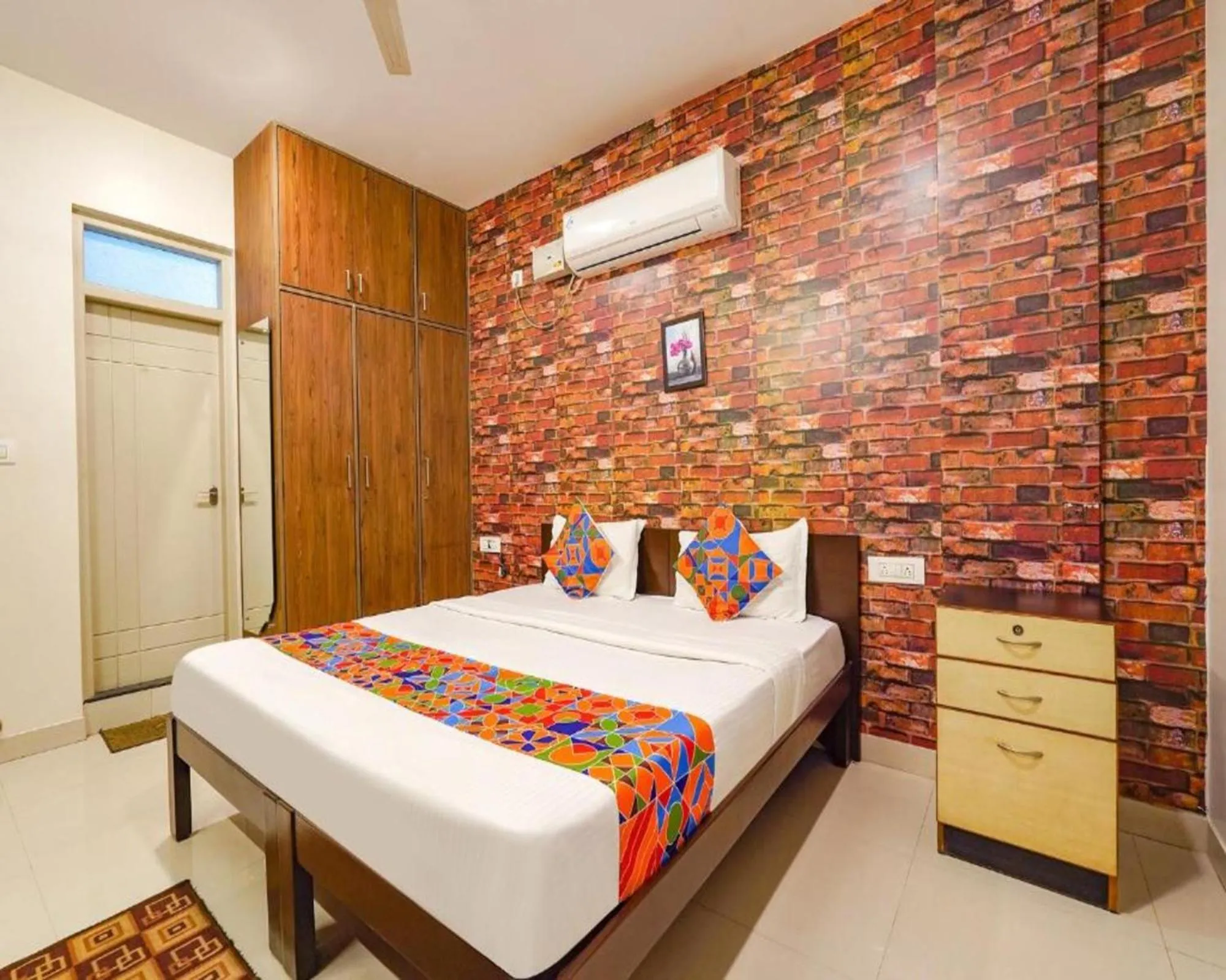 Bed in FabExpress Kings Suites HRBR Layout - Nr Manyata Tech Park