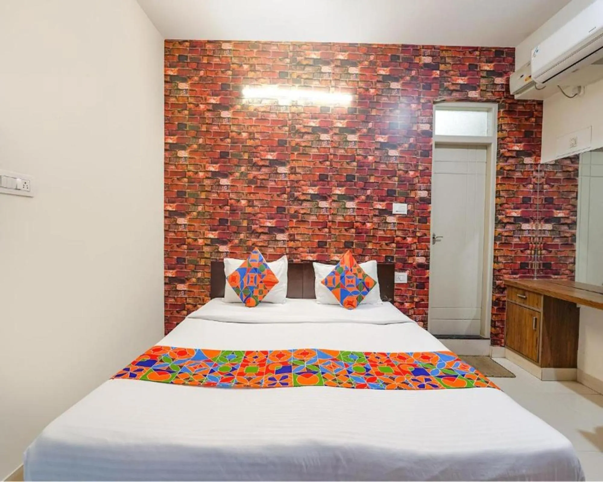 Bed in FabExpress Kings Suites HRBR Layout - Nr Manyata Tech Park