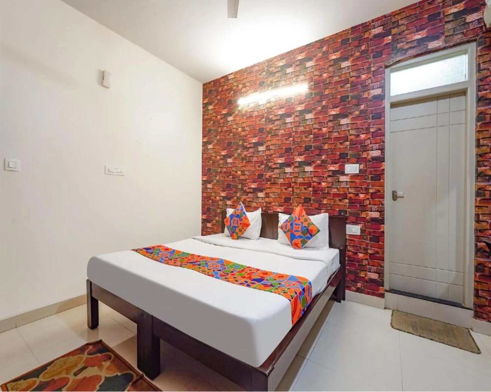 Bed in FabExpress Kings Suites HRBR Layout - Nr Manyata Tech Park