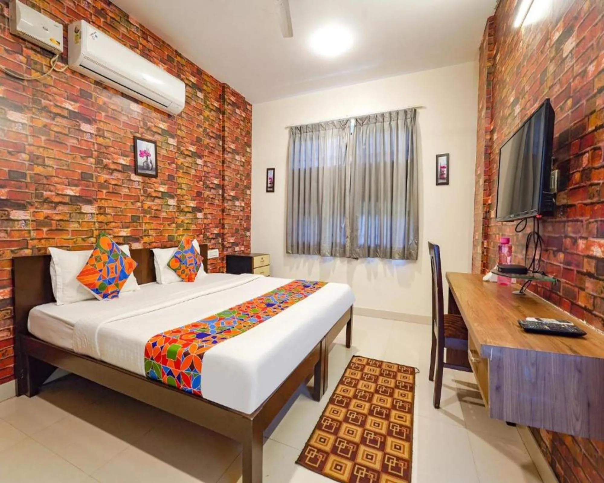 Bed in FabExpress Kings Suites HRBR Layout - Nr Manyata Tech Park