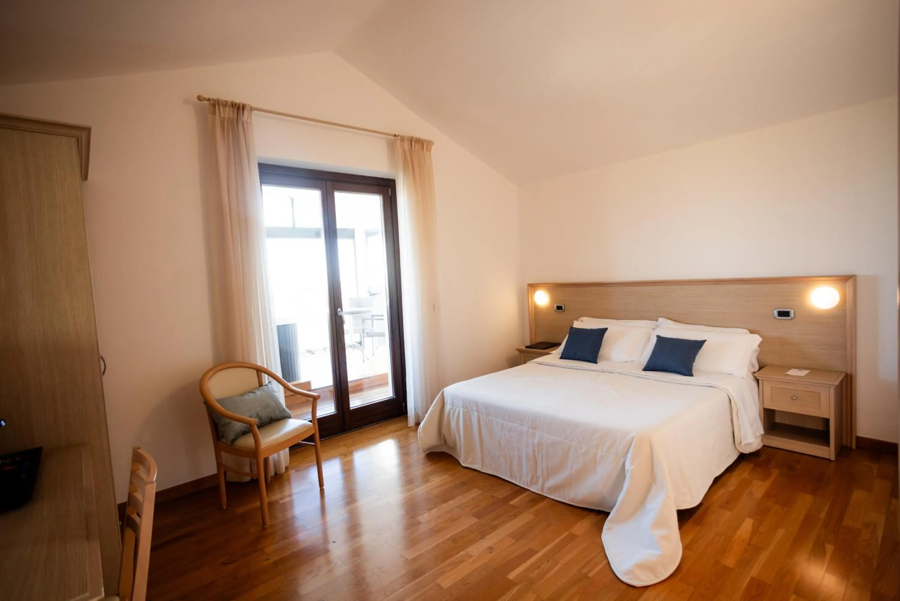 Bed in Magnificat Hotel&Resort