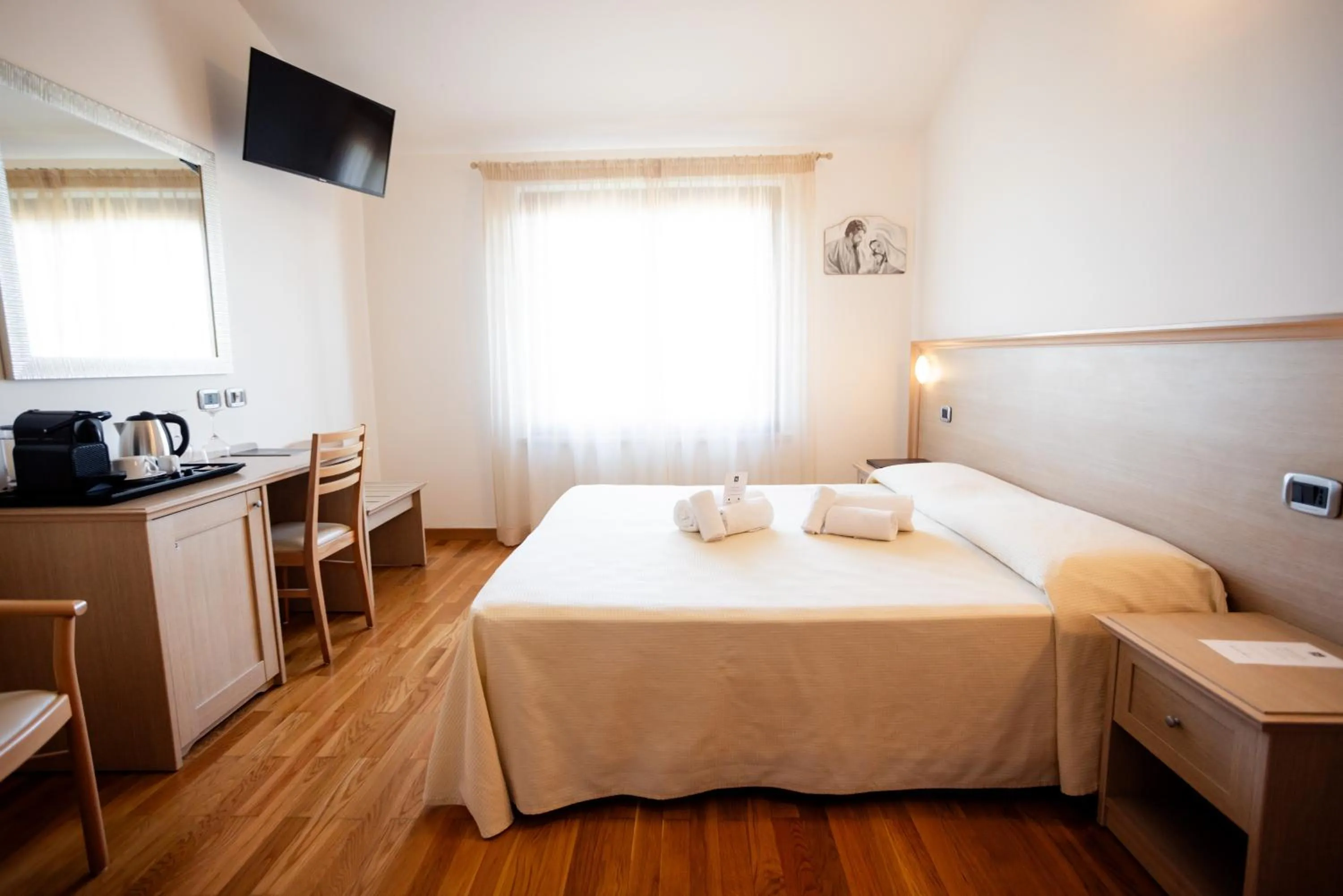 Bed in Magnificat Hotel&Resort