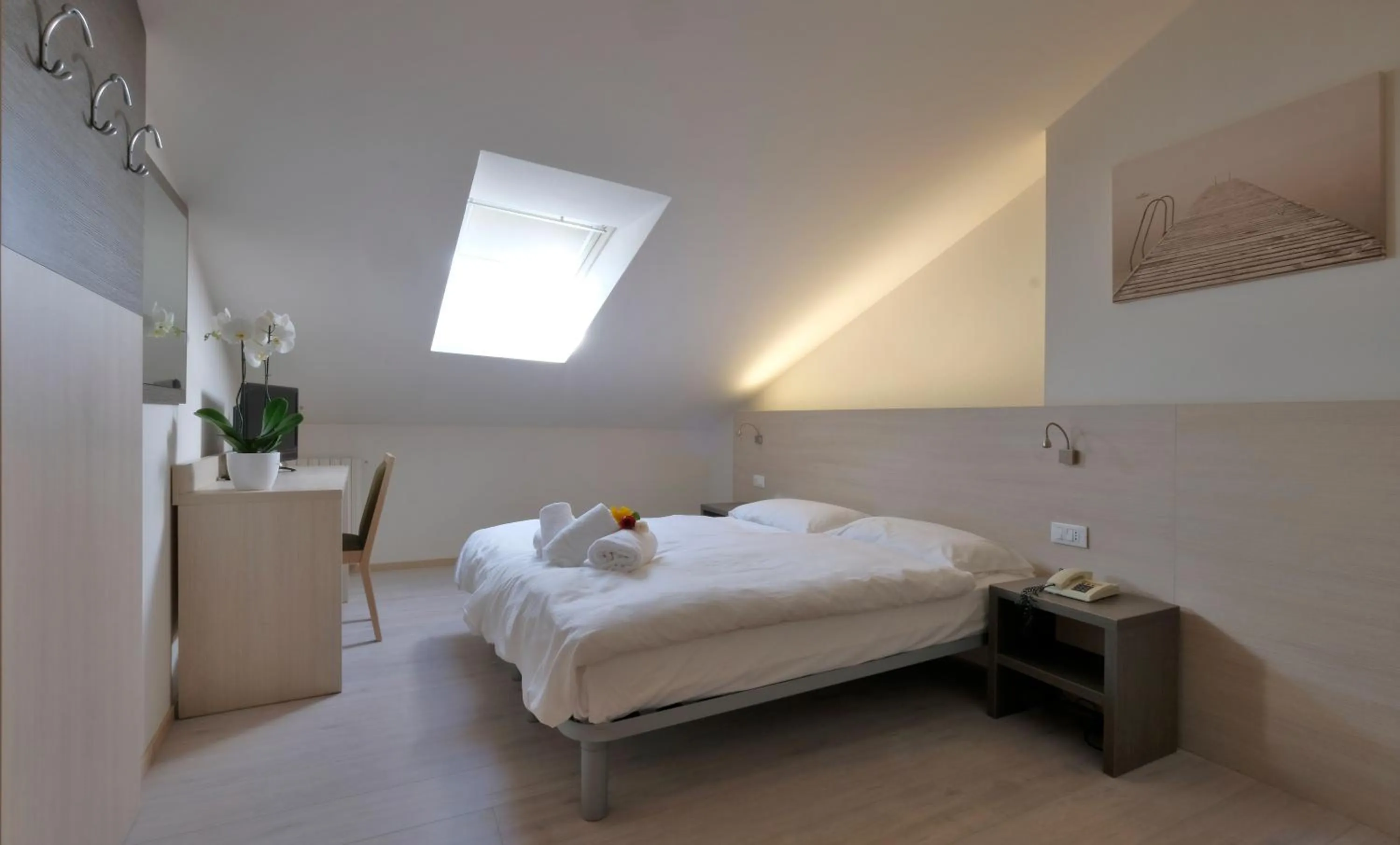 Bed in Hotel Gelmini