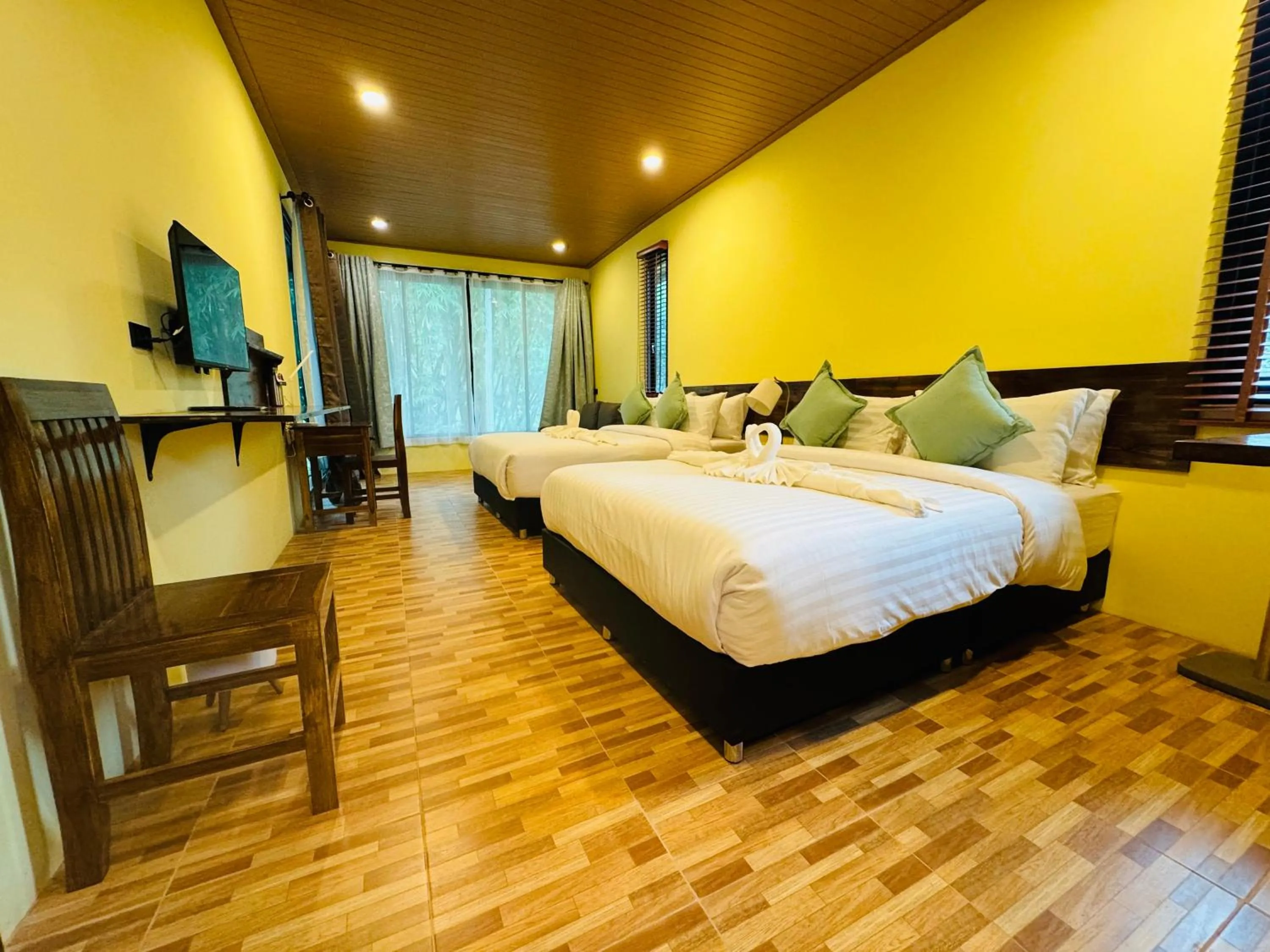 Bed in The Bliss Khao Sok Boutique Lodge