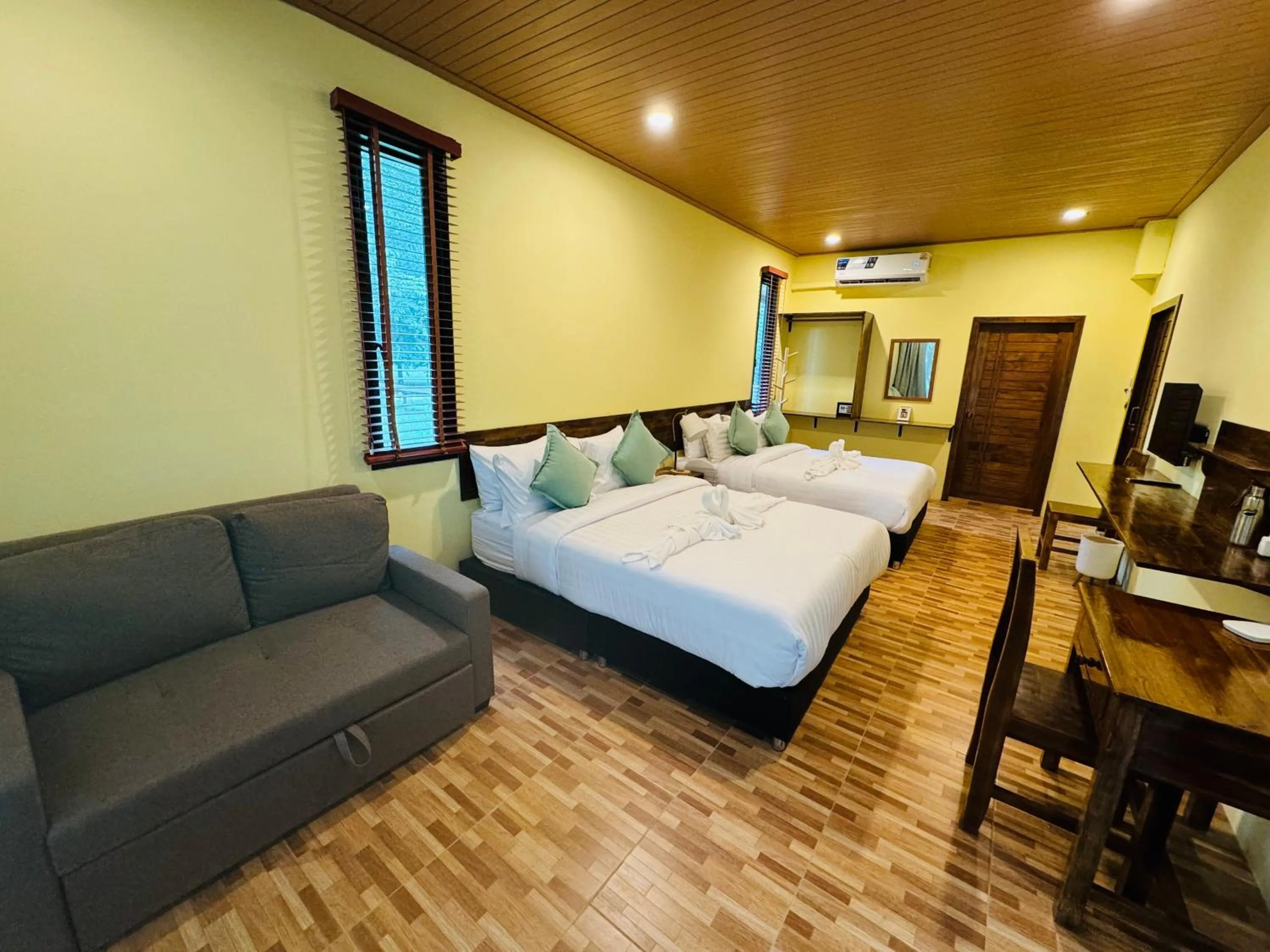 Bed in The Bliss Khao Sok Boutique Lodge