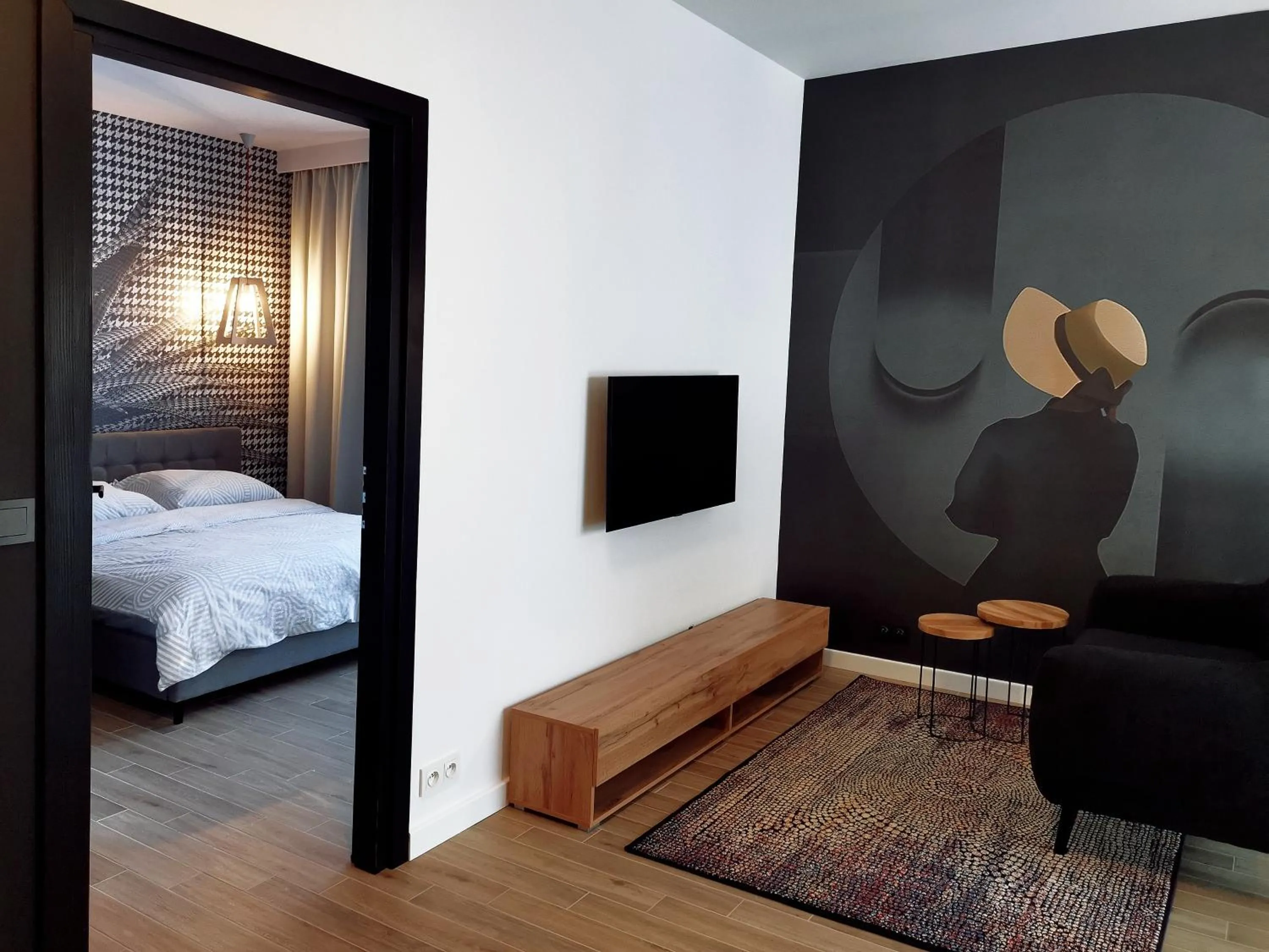 Living room, Bed in Come&Stay apartments Wola
