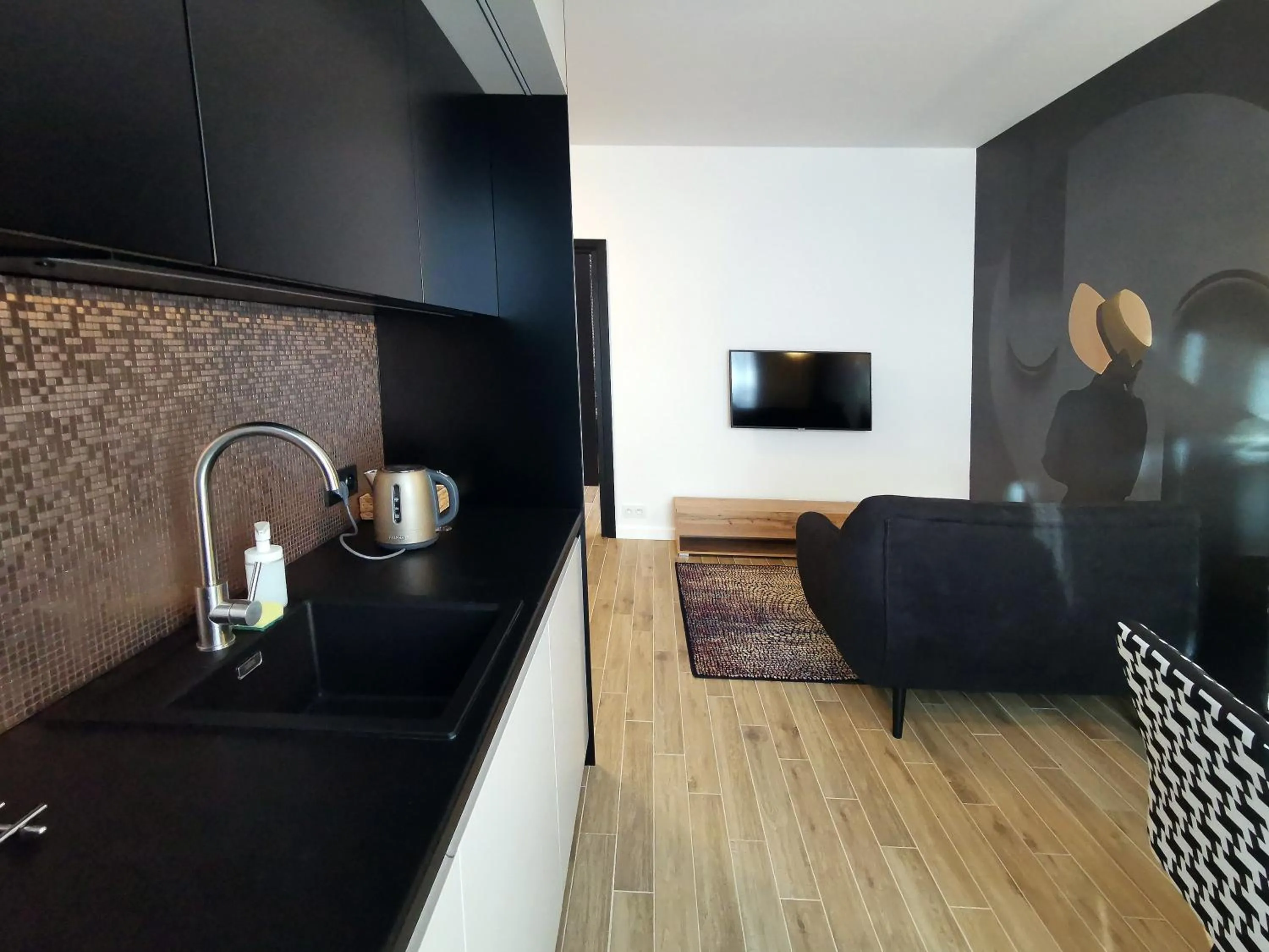 Kitchen or kitchenette in Come&Stay apartments Wola