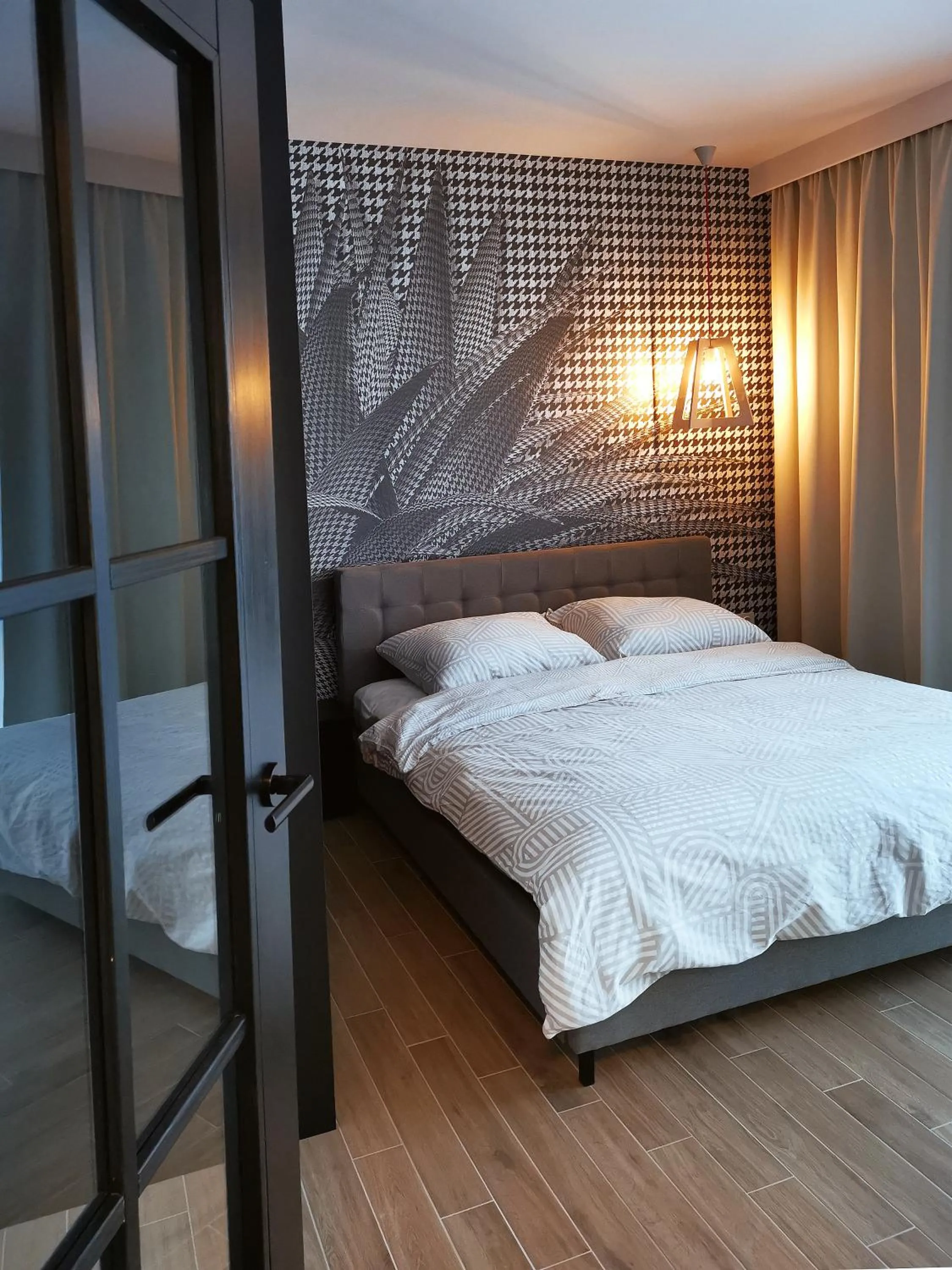 Bed in Come&Stay apartments Wola