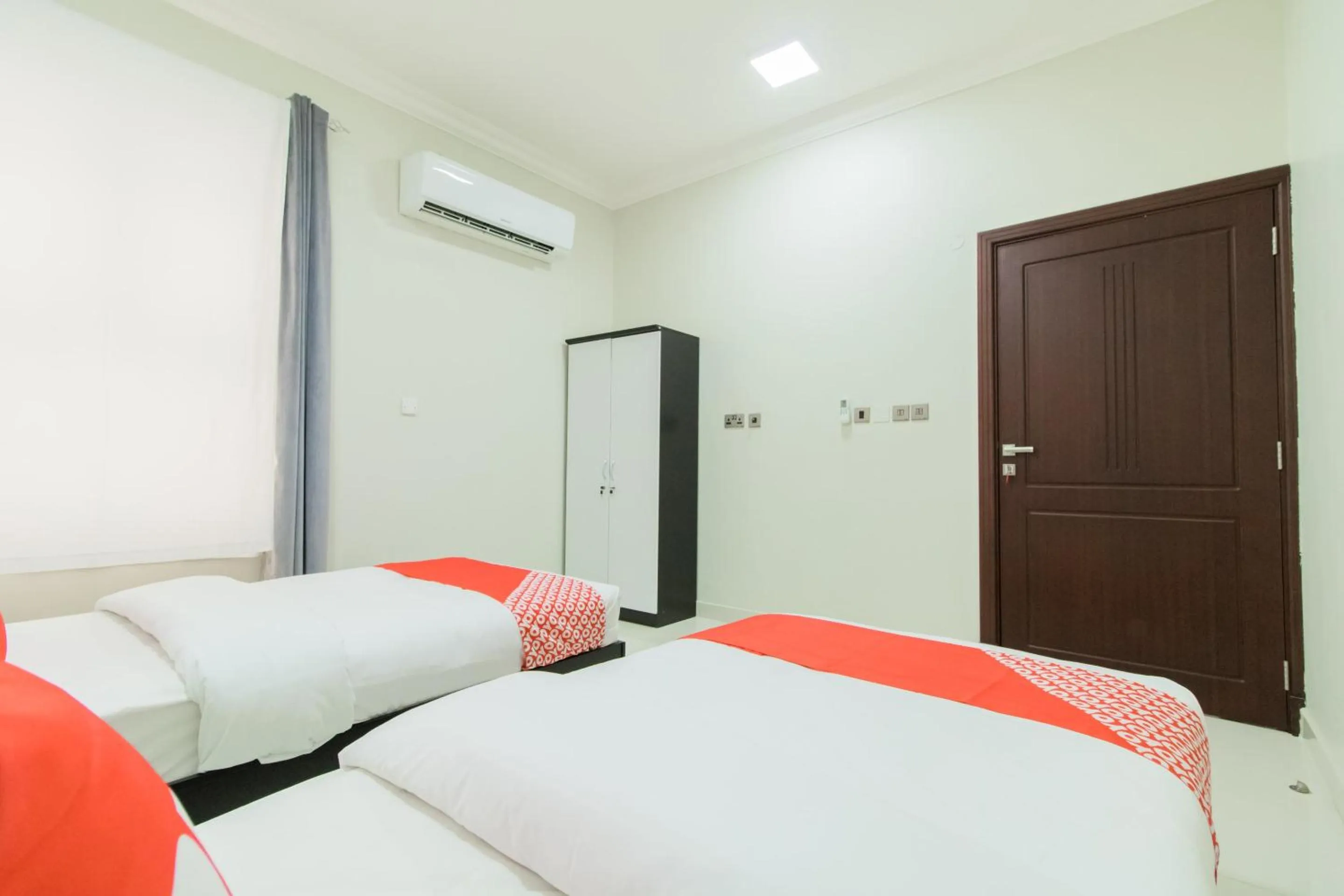 Bedroom, Bed in Super OYO 106 Muscat Grand Hotel Apartment