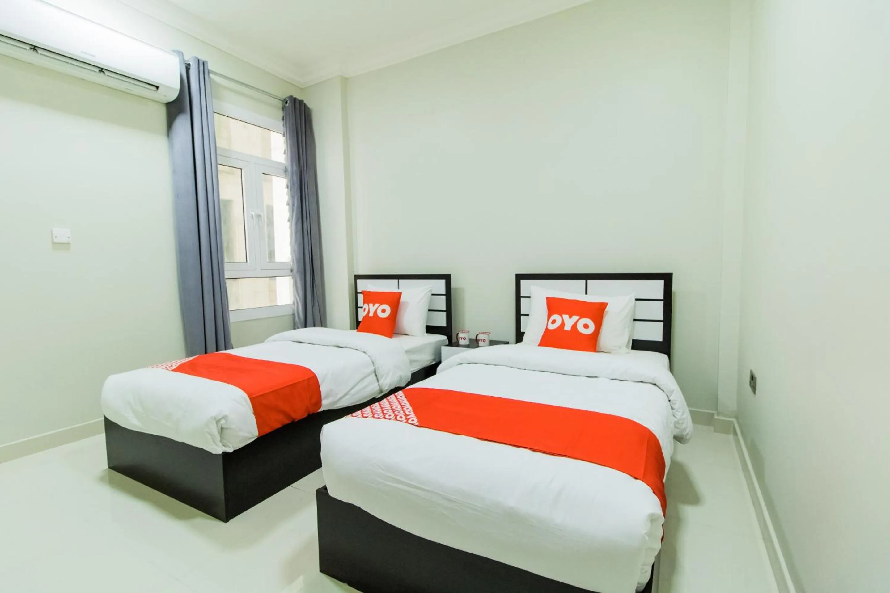 Bedroom, Bed in Super OYO 106 Muscat Grand Hotel Apartment