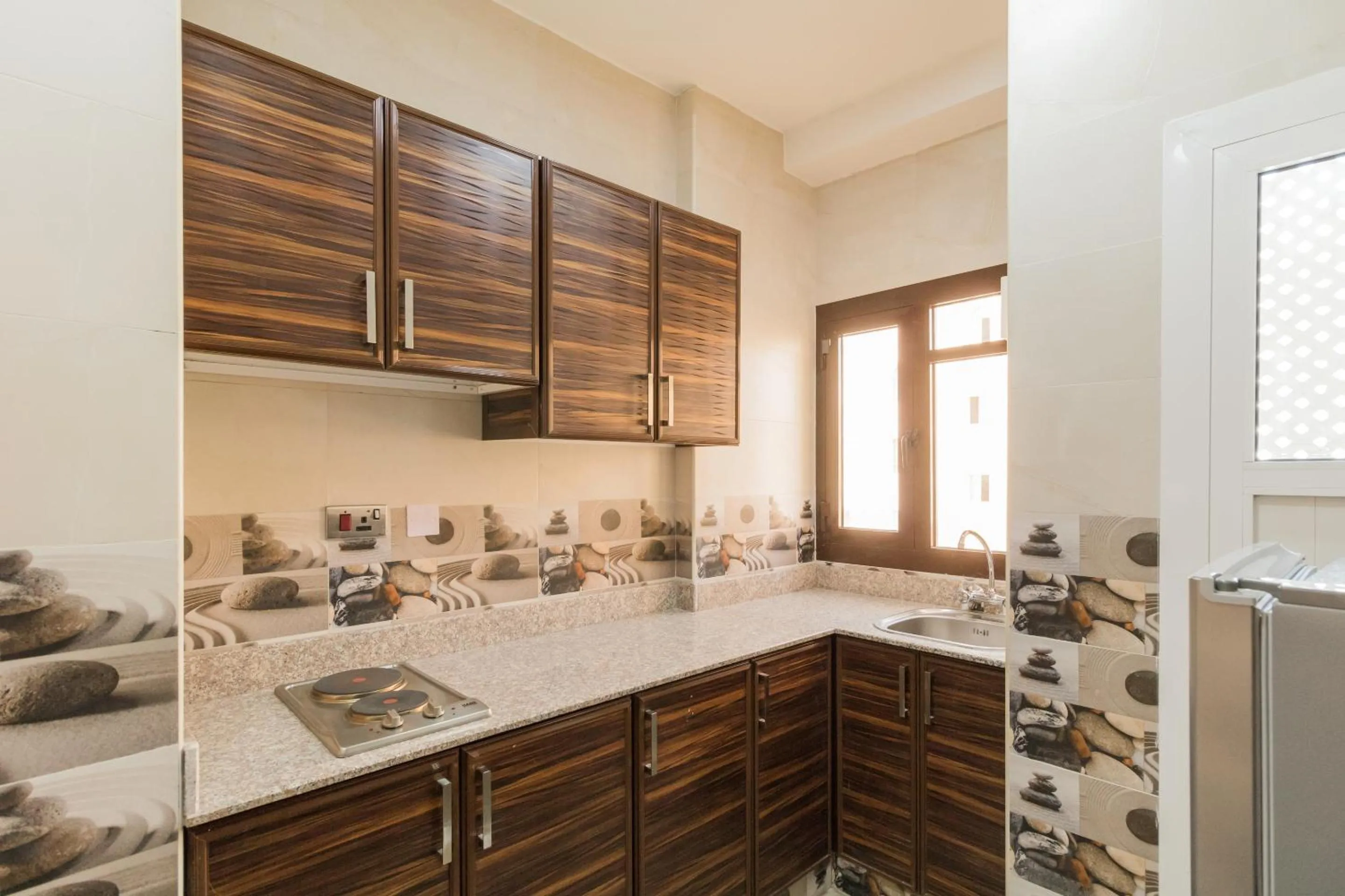 Bedroom in Super OYO 106 Muscat Grand Hotel Apartment