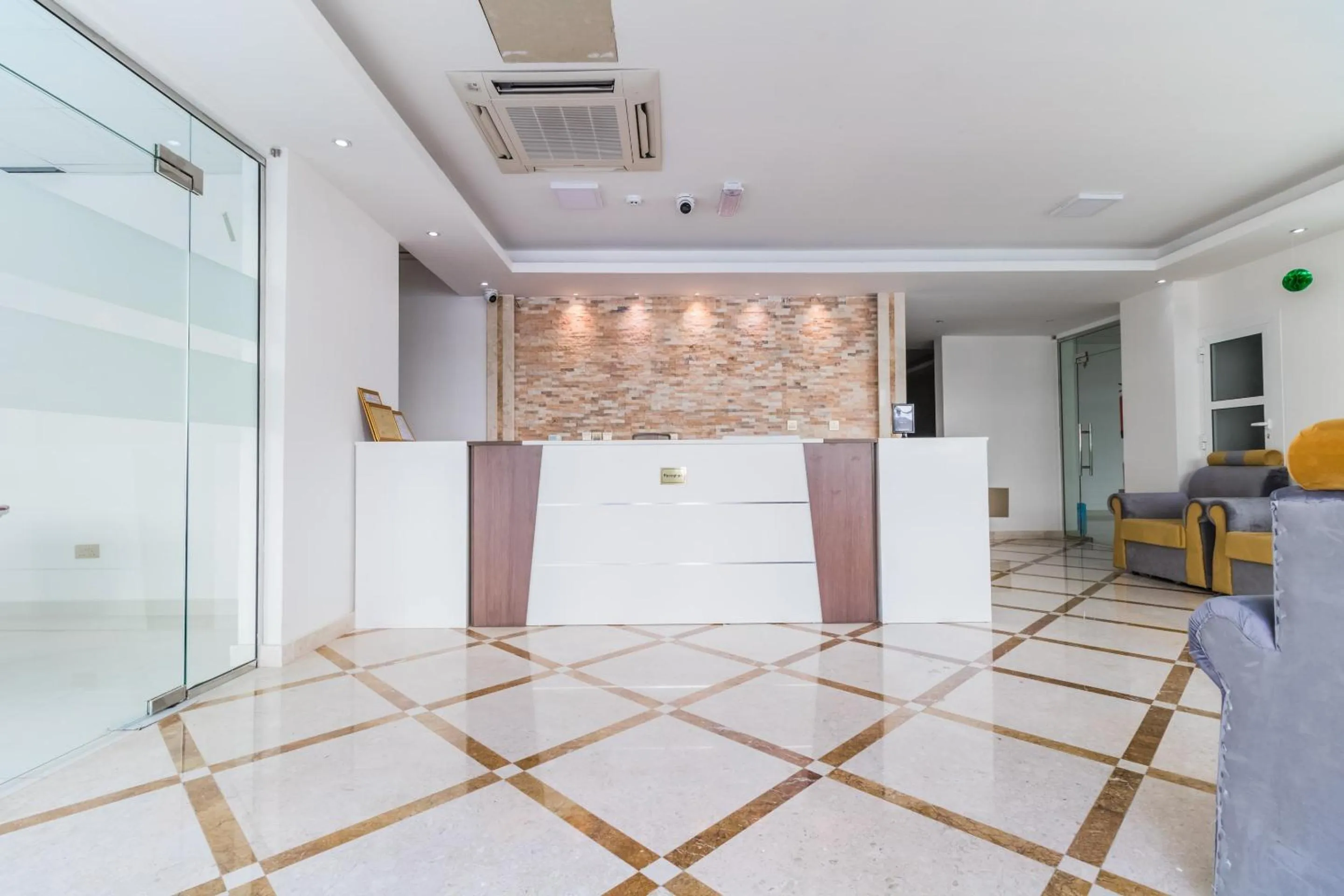 Lobby or reception in Super OYO 106 Muscat Grand Hotel Apartment