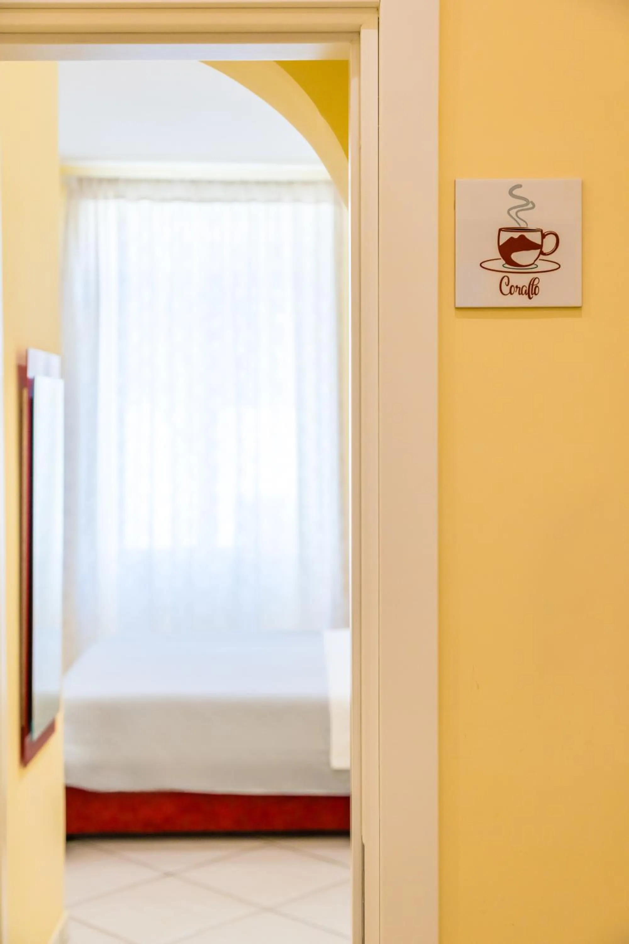 Property logo or sign, Bed in La Casa Di Bruno Napoli