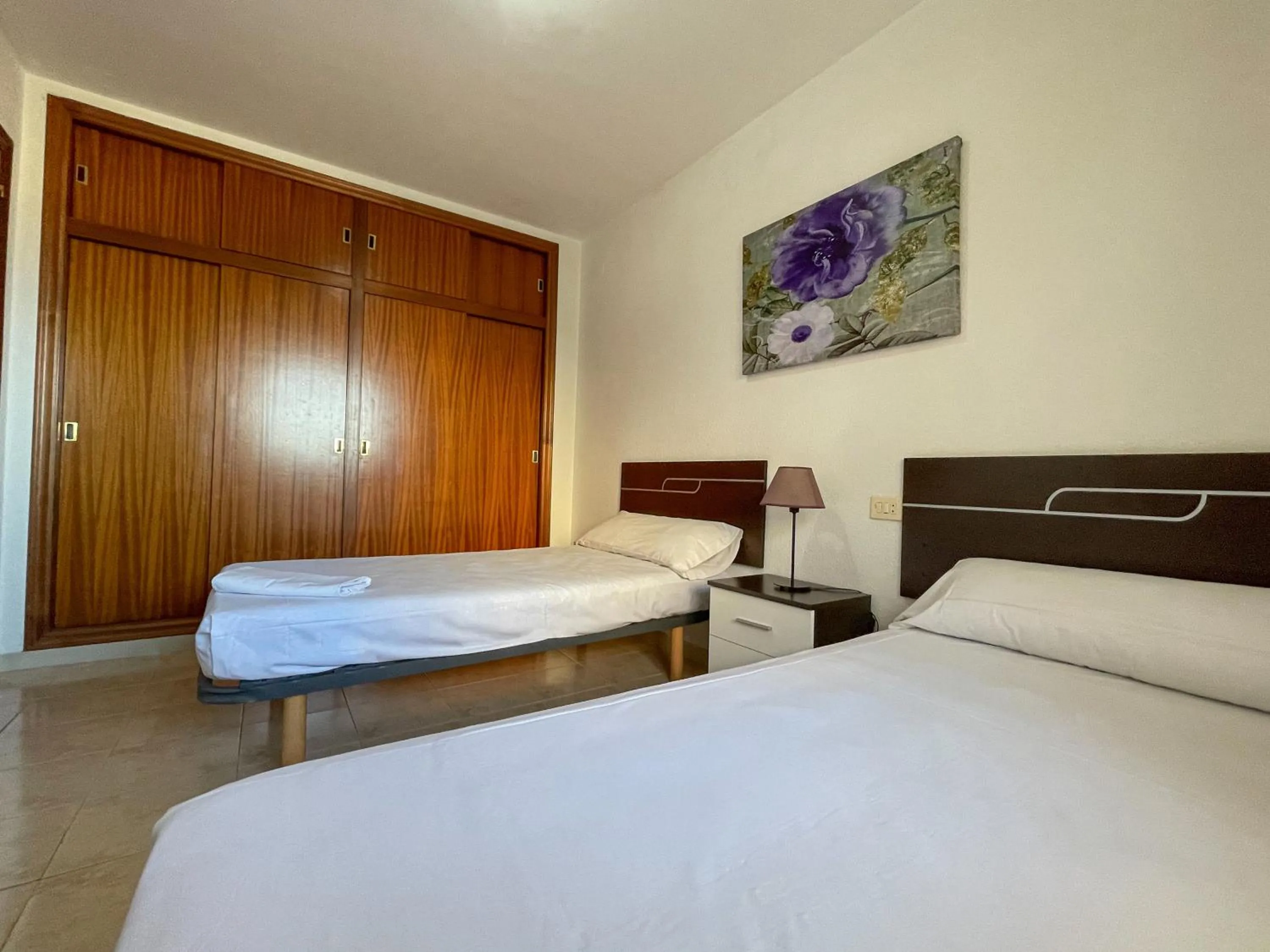 Bed in Apartamentos Neptuno Oropesa 3000