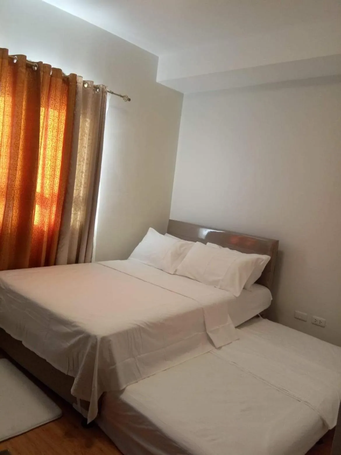Bed in Mesaverte Residences AFS Suites