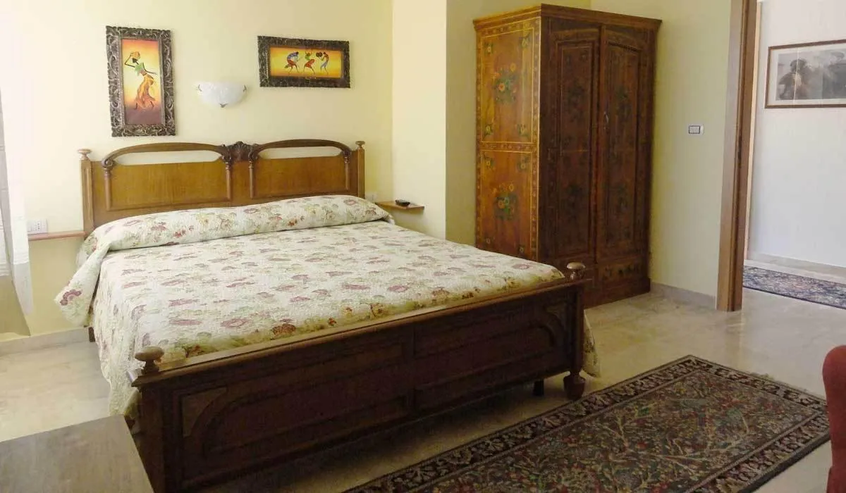 Photo of the whole room, Bed in affittacamere S'Ortensia