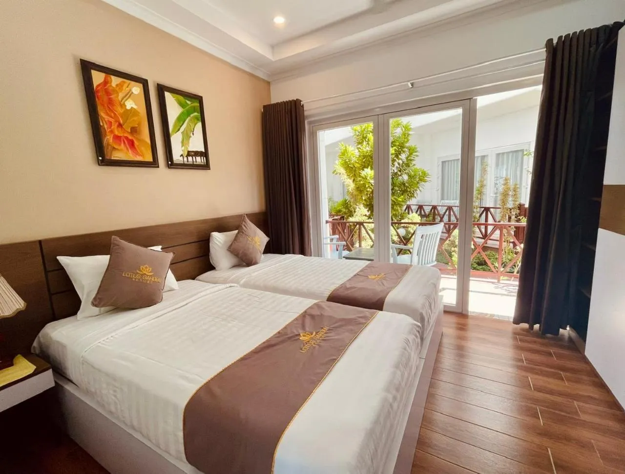 Bed in Lotus Garden Muine Resort & Spa