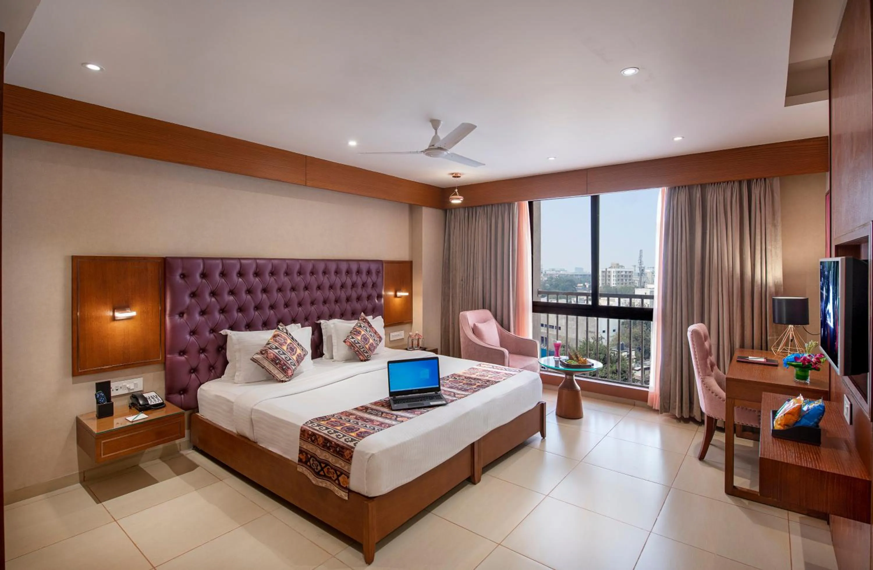 Photo of the whole room, Bed in SK Lords Inn Ahmedabad