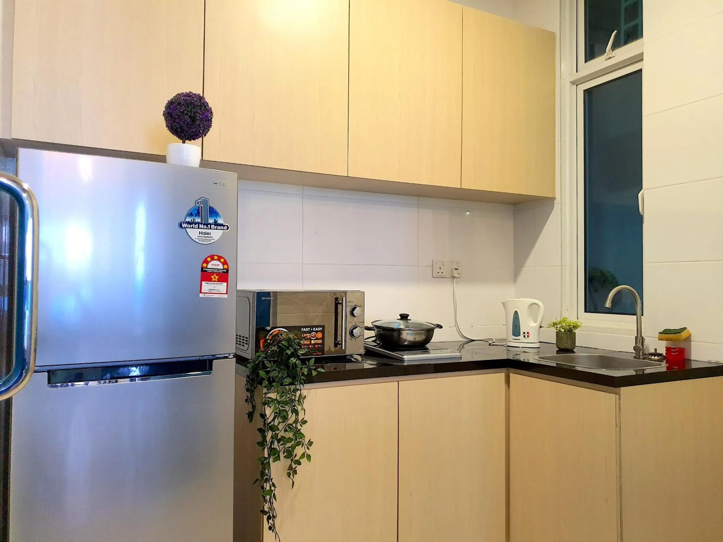 Kitchen or kitchenette in The Wave Suites Melaka