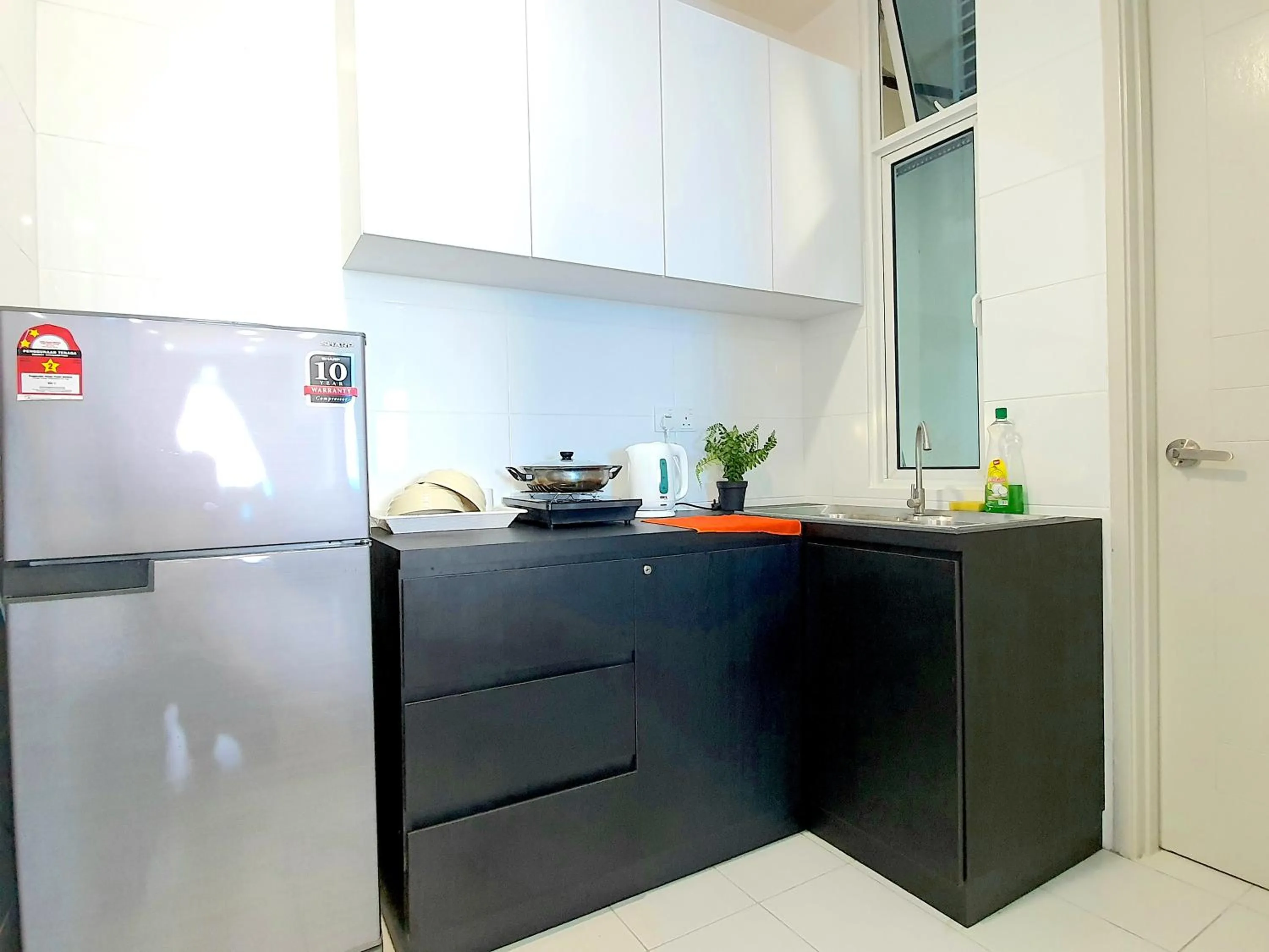 Kitchen or kitchenette in The Wave Suites Melaka