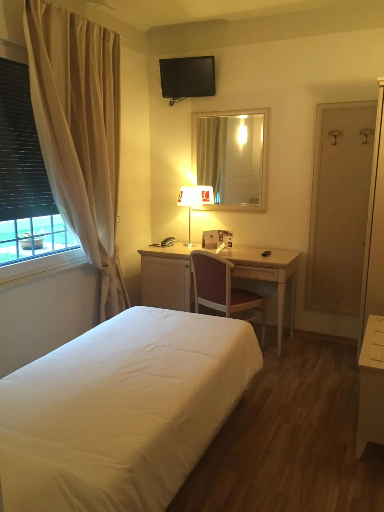 Photo of the whole room, Bed in Albergo La Quiete