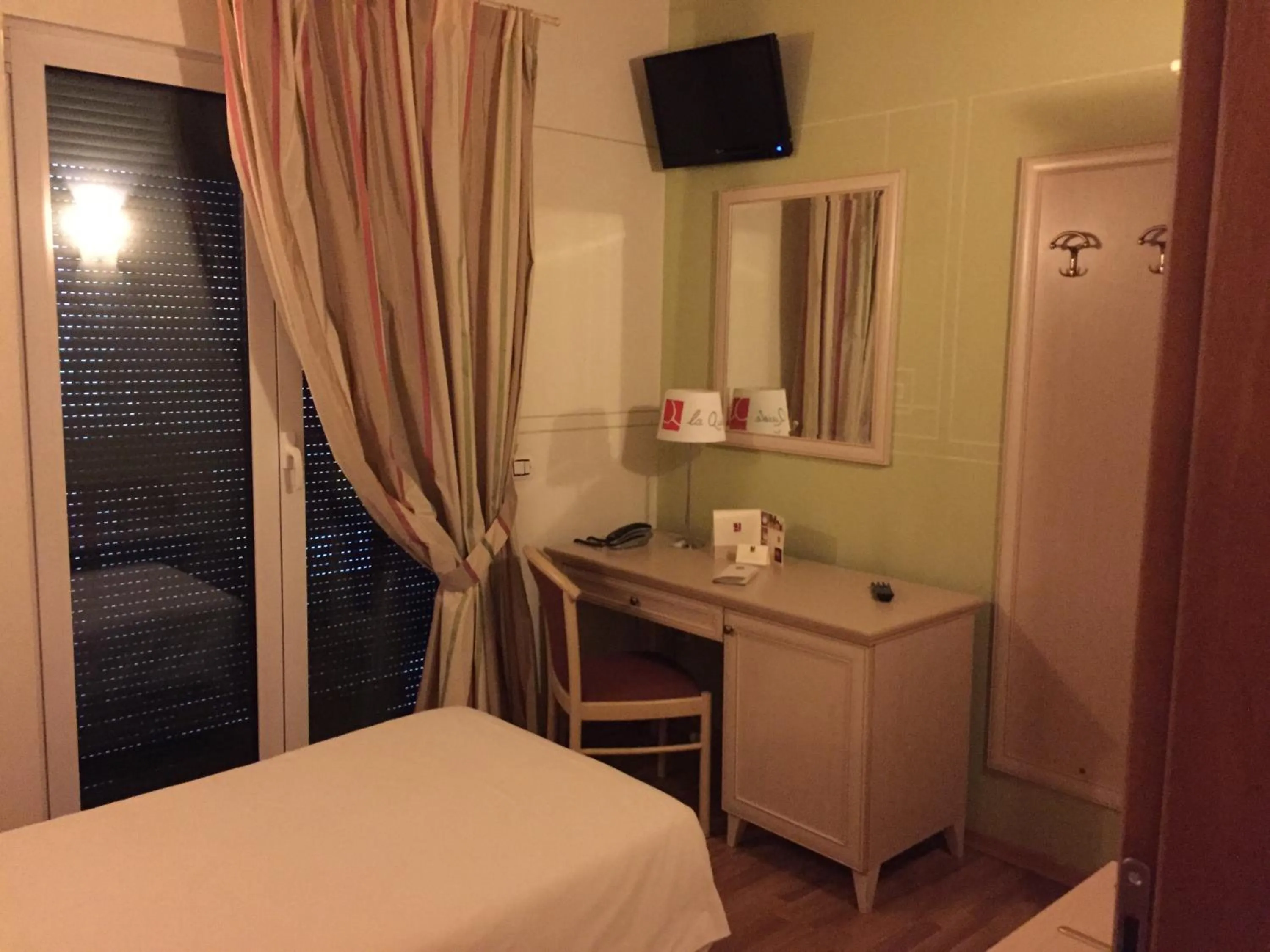 Photo of the whole room, Bed in Albergo La Quiete