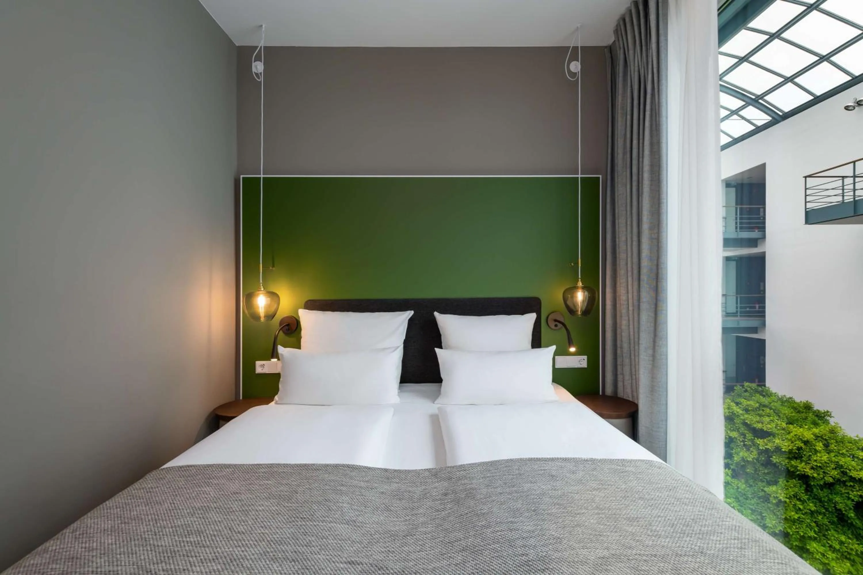 Bedroom, Bed in Flightgate Munich Airport Hotel, a member of Radisson Individuals