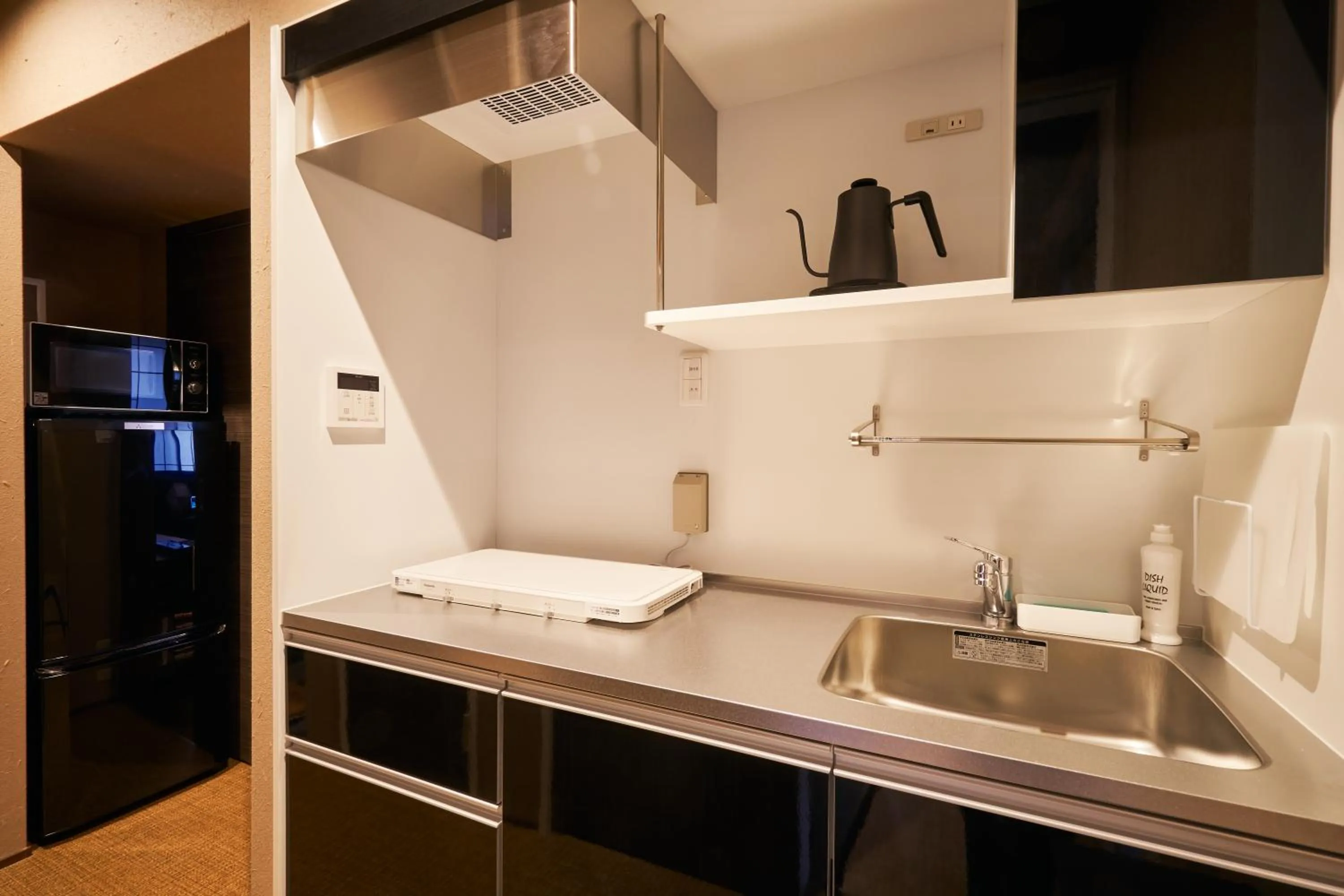 Kitchen or kitchenette in プライベートホテル 四季の彩