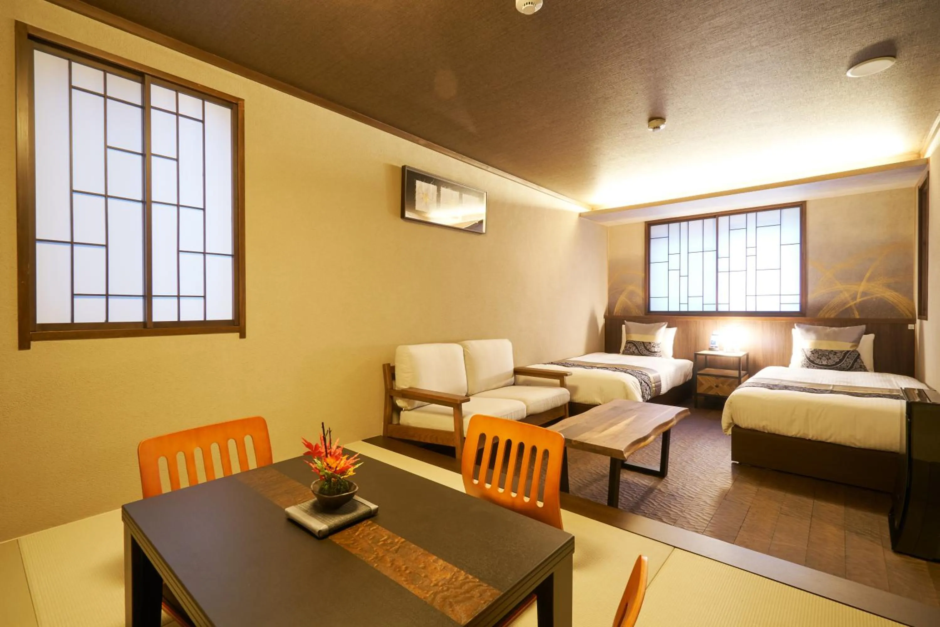 Seating area, Bed in プライベートホテル 四季の彩