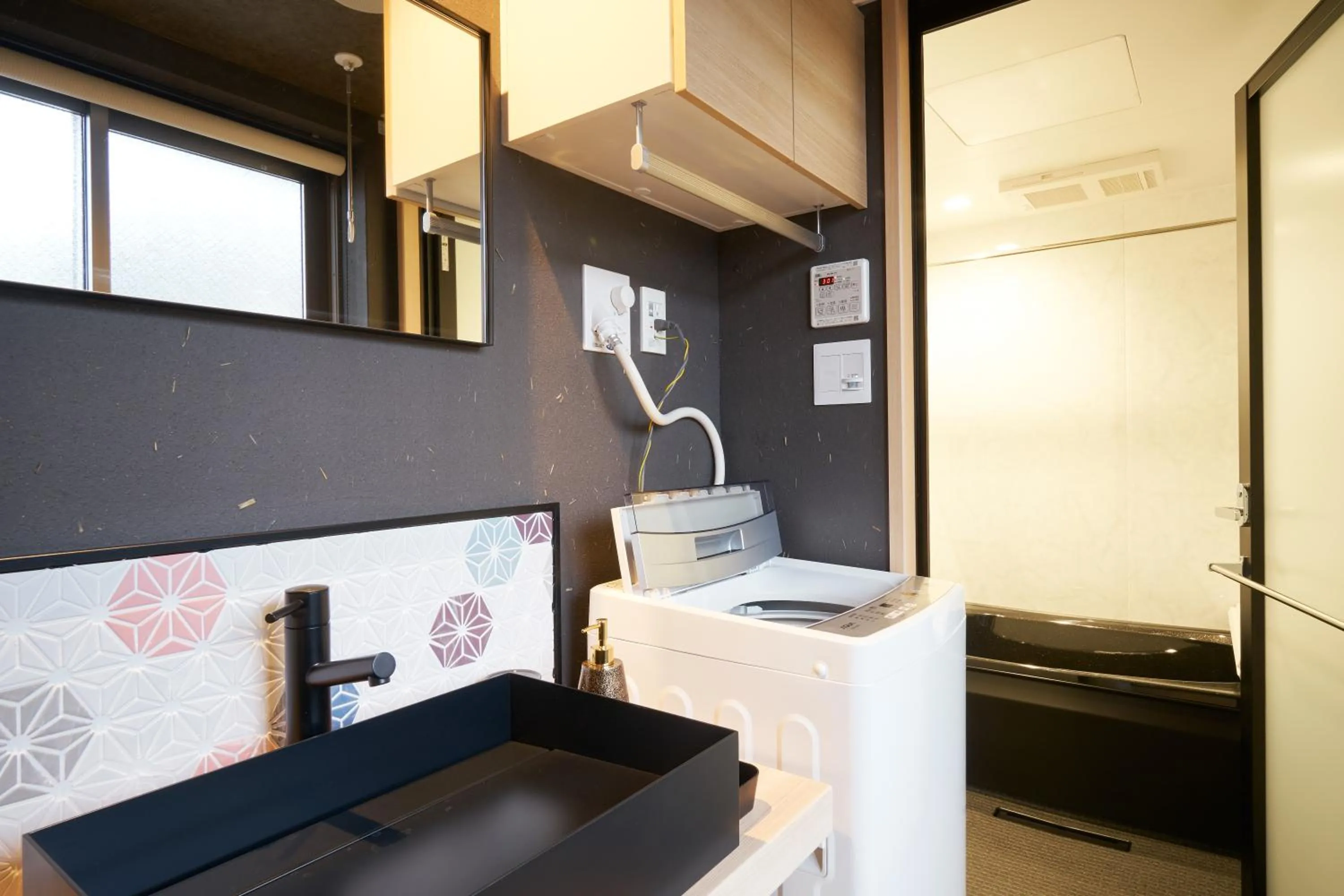washing machine in プライベートホテル 四季の彩
