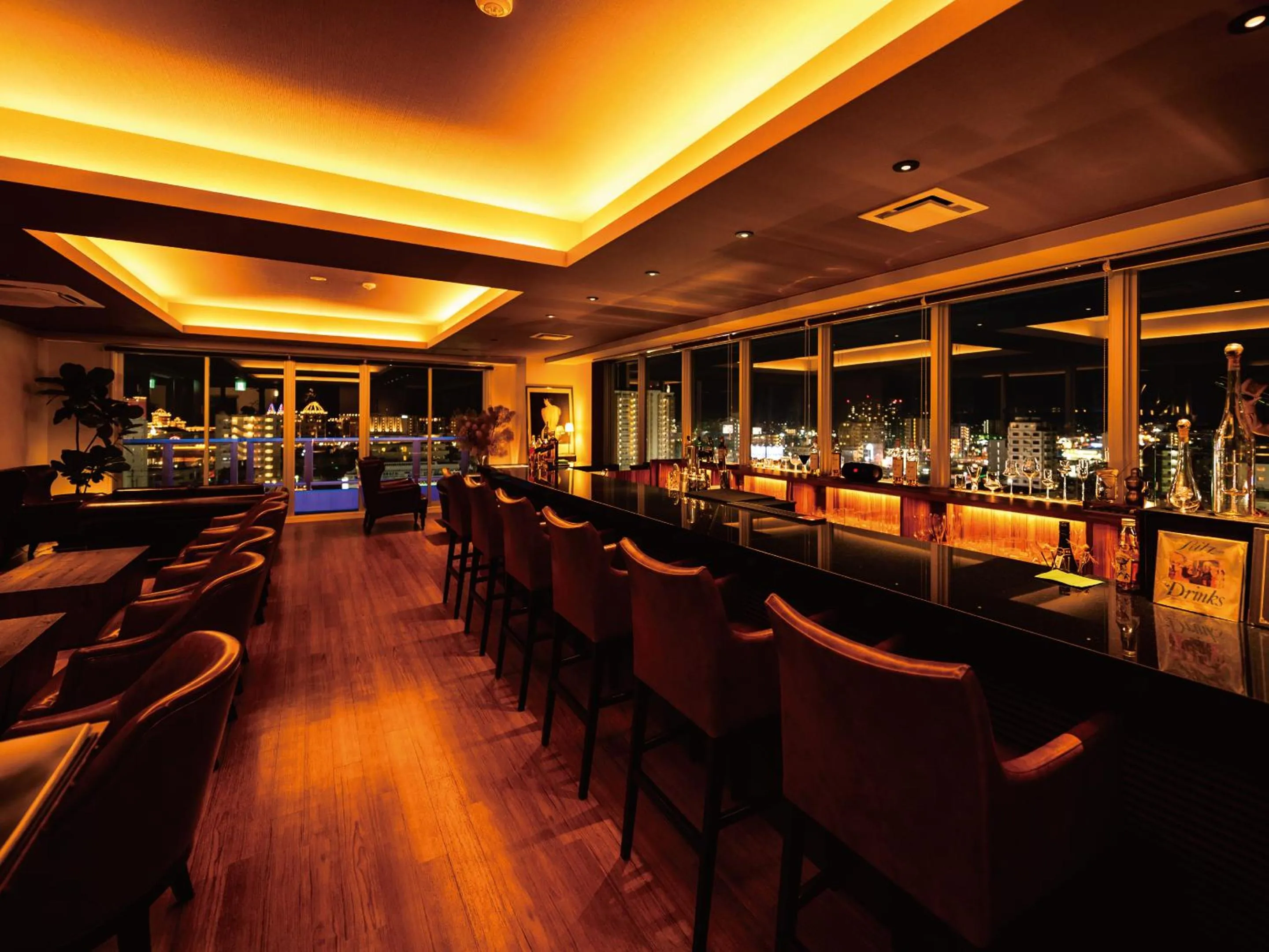 Lounge or bar in Aqua Palace Chatan by Coldio Premium