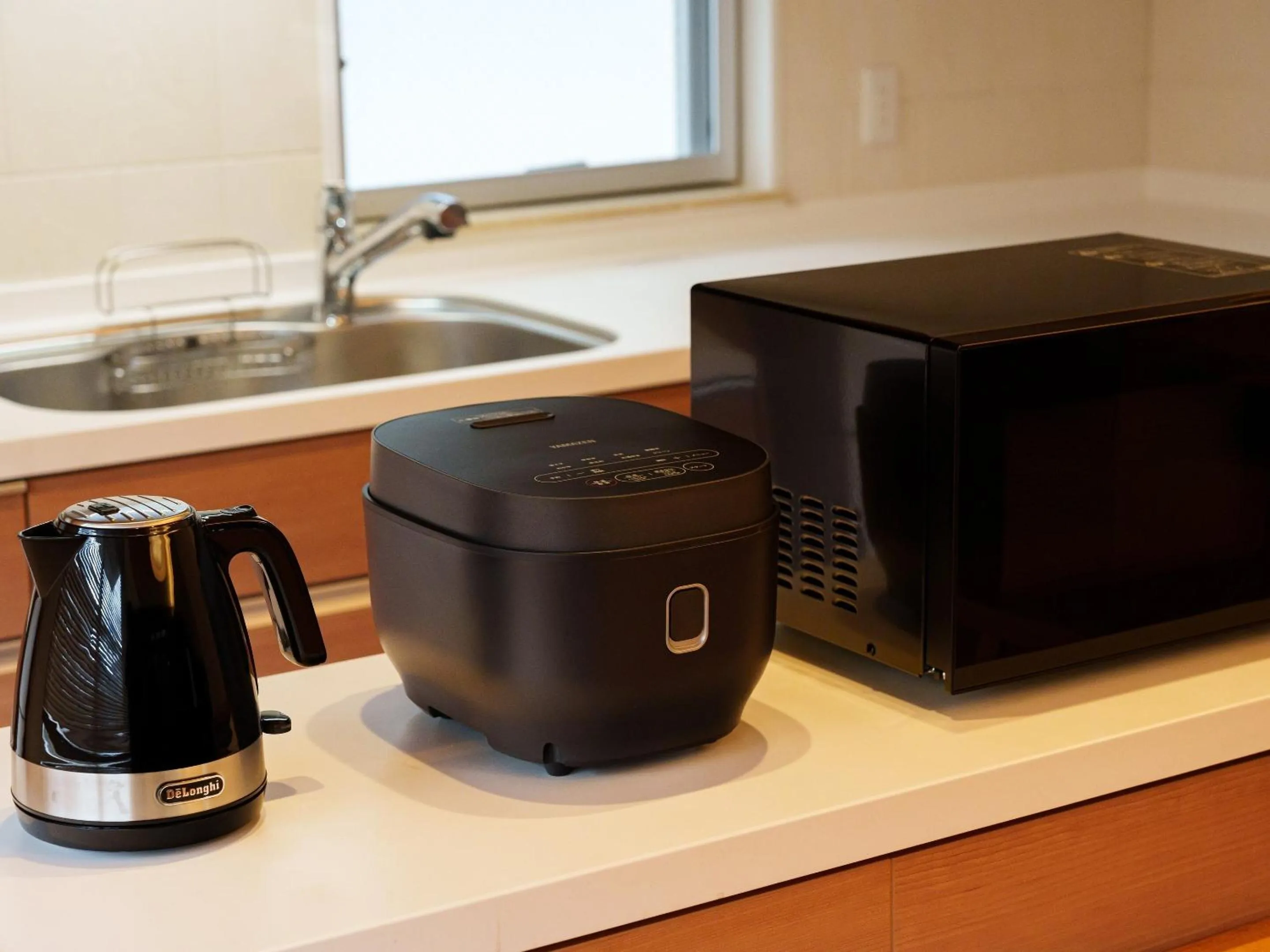 kitchen in Aqua Palace Chatan by Coldio Premium