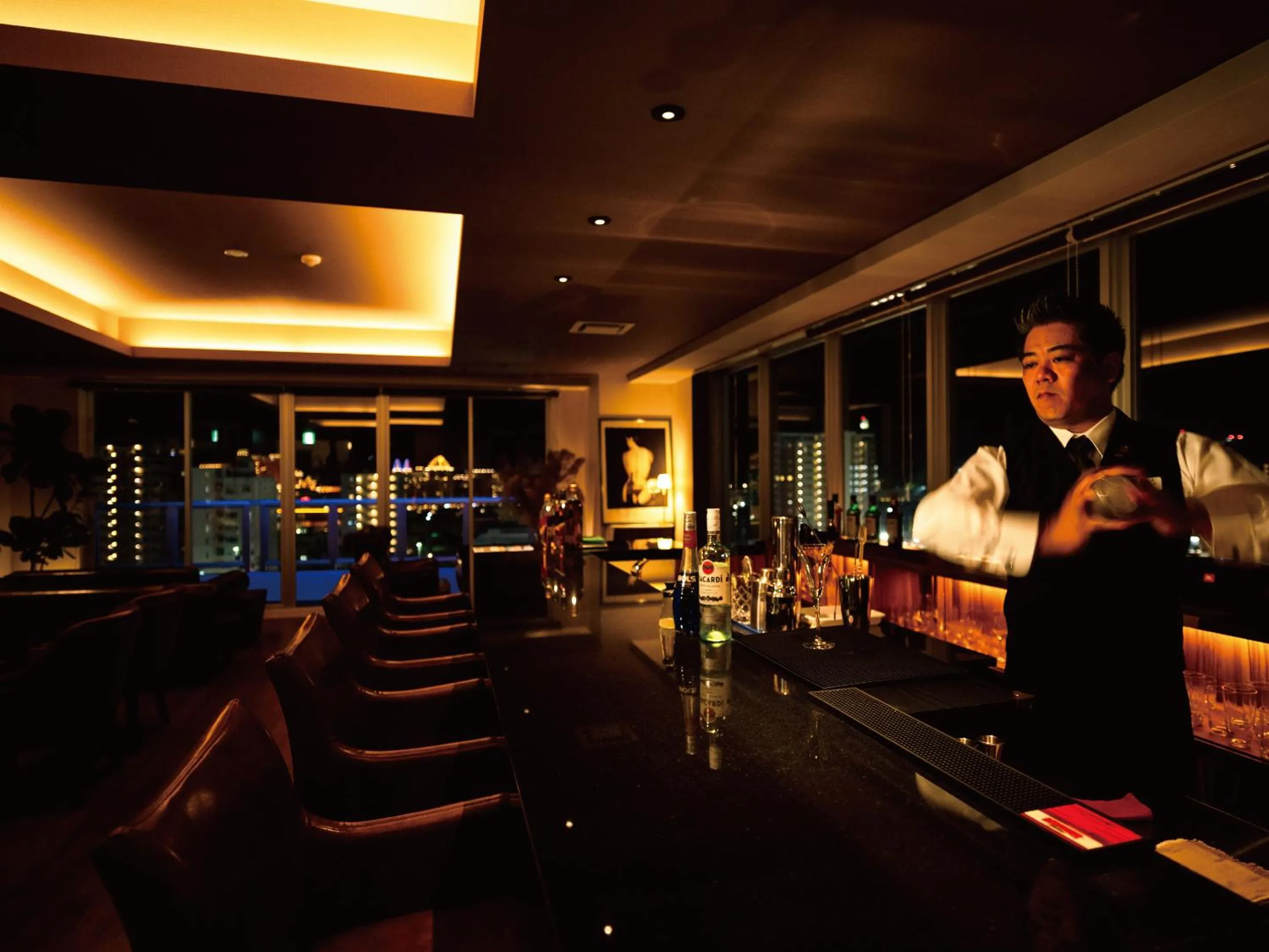 Lounge or bar in Aqua Palace Chatan by Coldio Premium