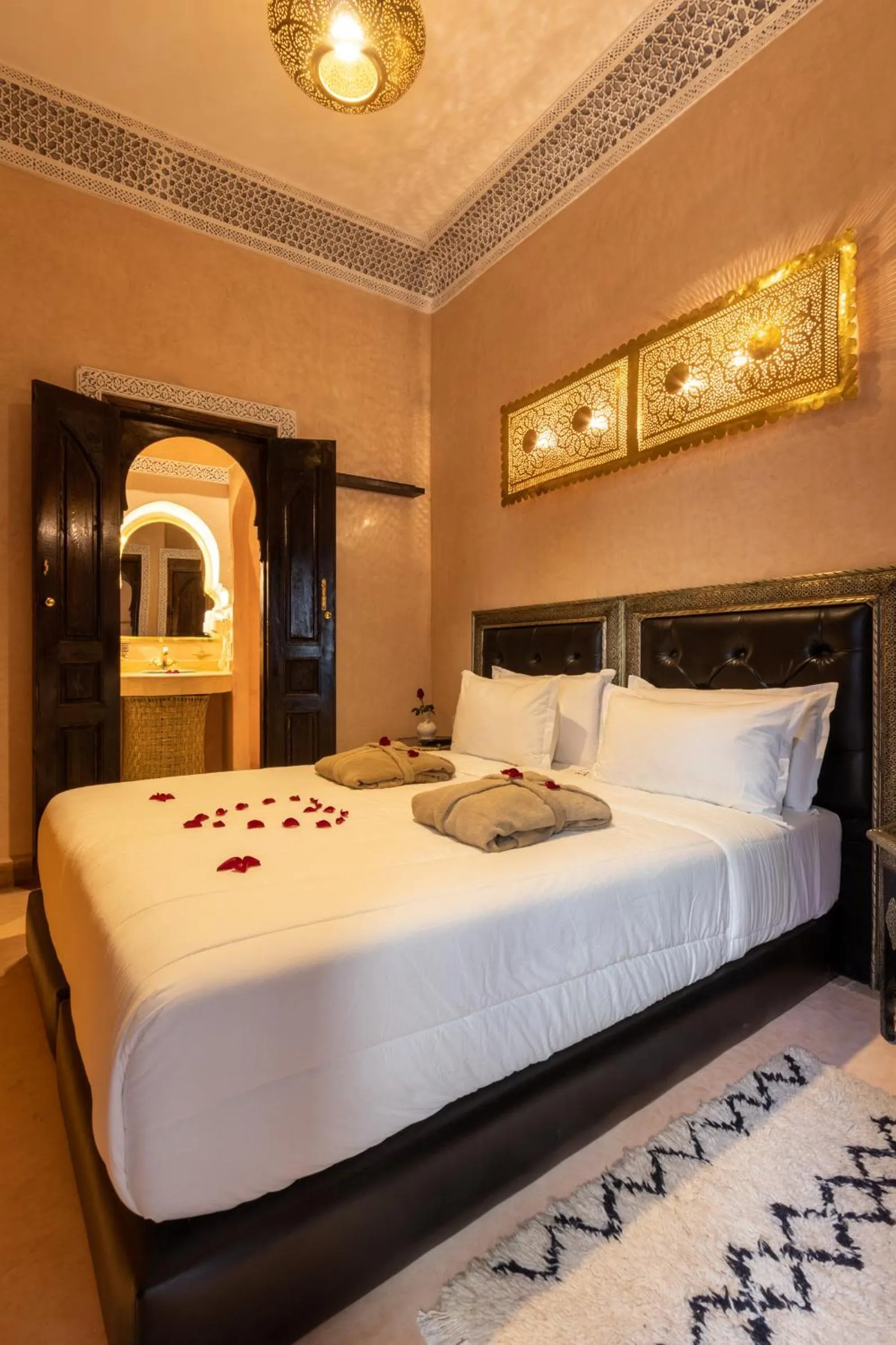 Bed in Riad Medina Art & Suites