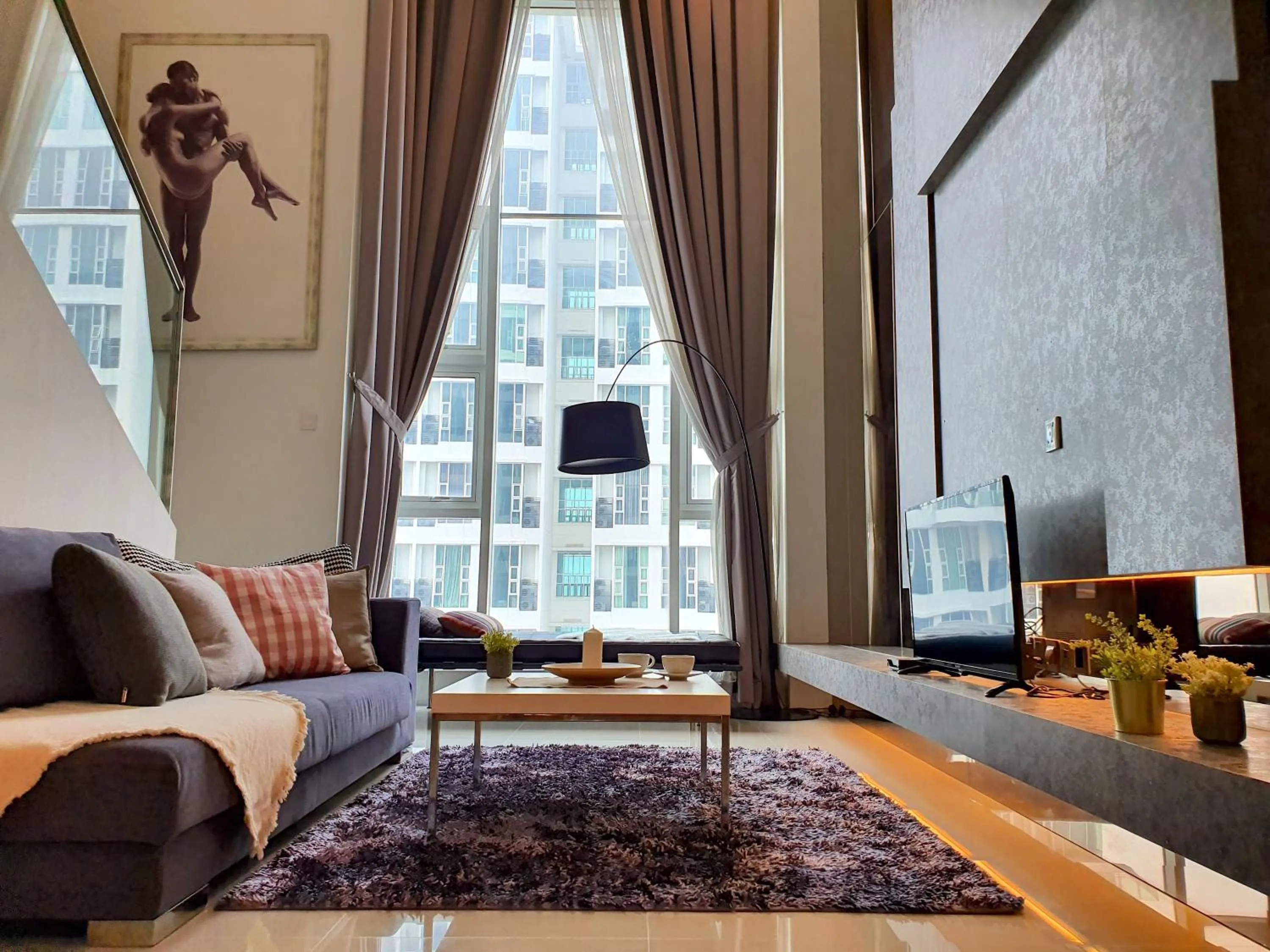 Living room in The Scott Garden Kuala Lumpur by BeeStay Management