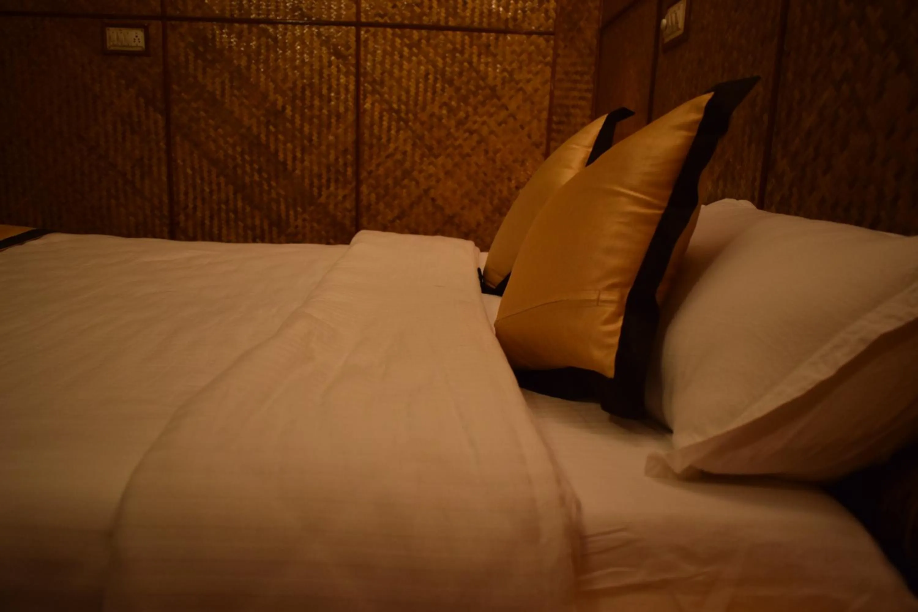 Bed in Blue Bird Resort