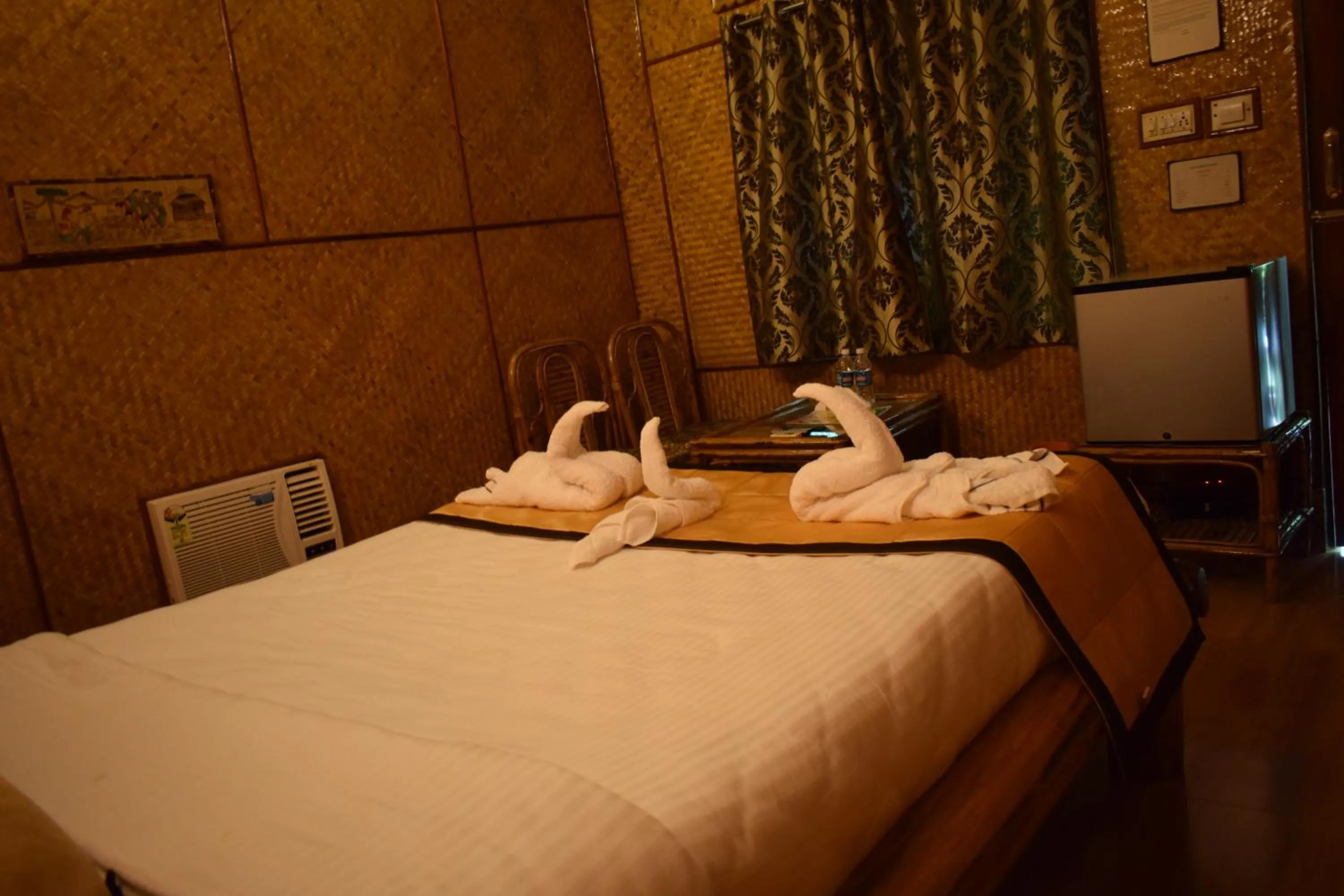 Bed in Blue Bird Resort