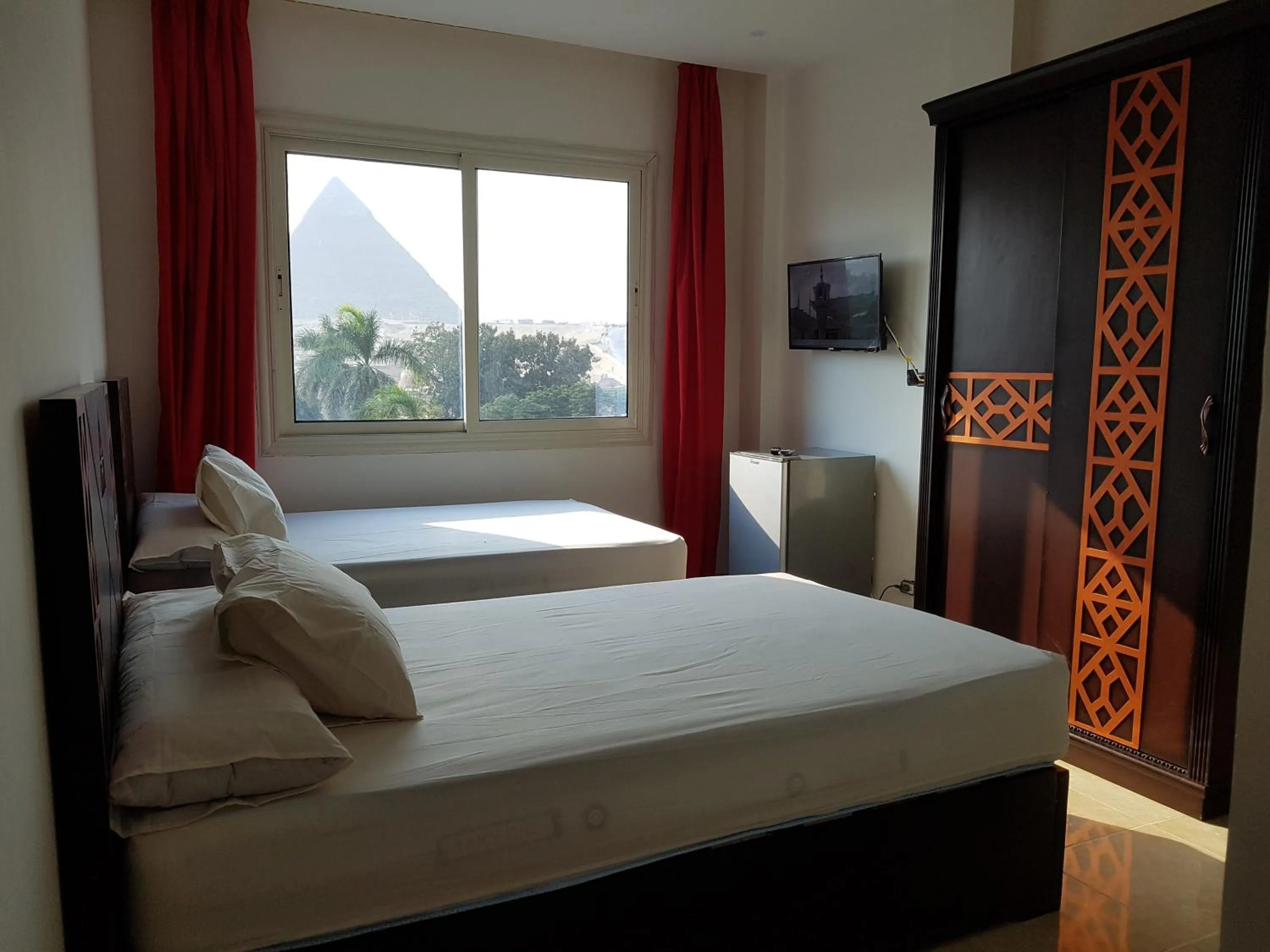 Bed in Sahara Pyramids Inn