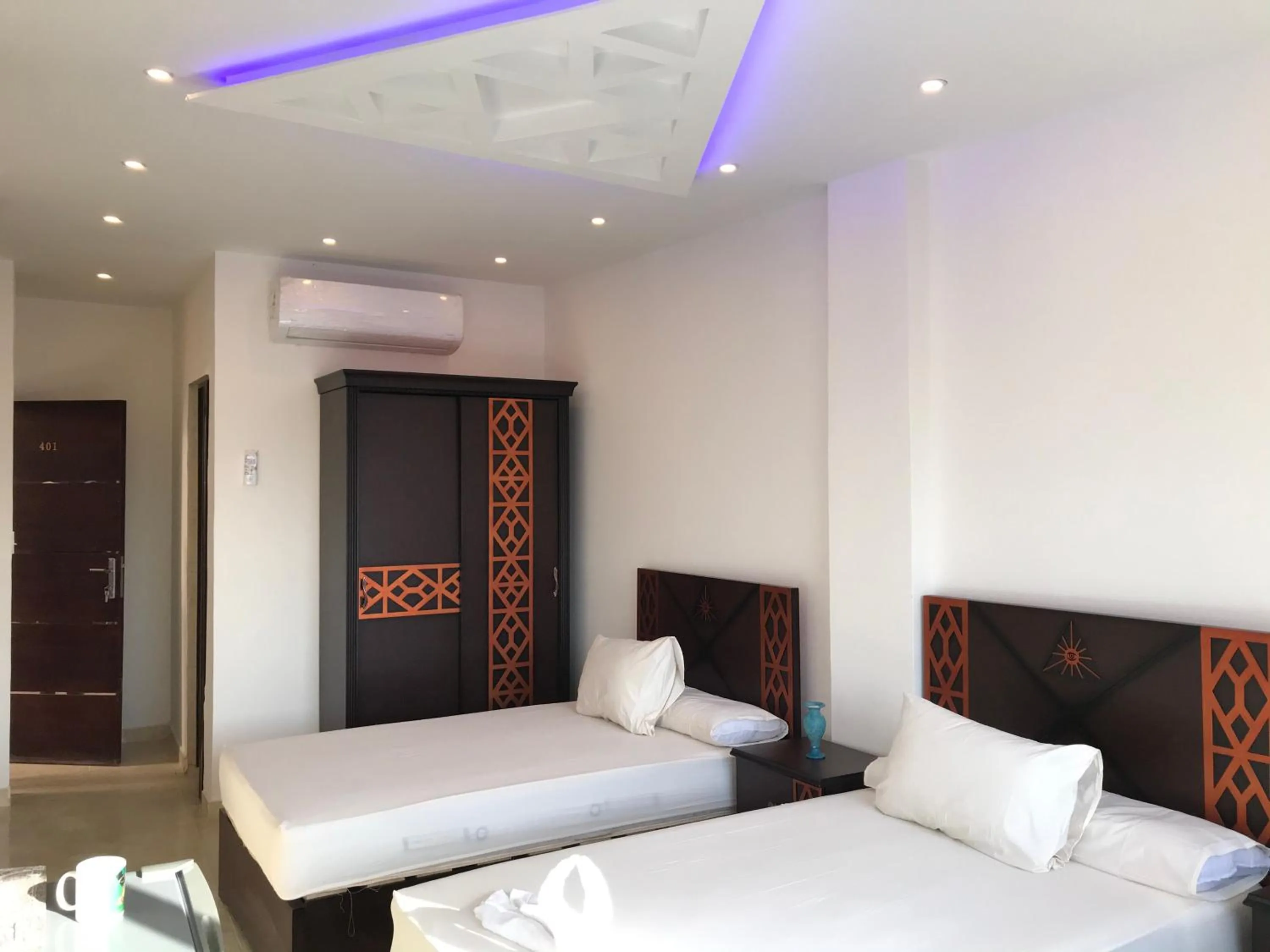 Bed in Sahara Pyramids Inn